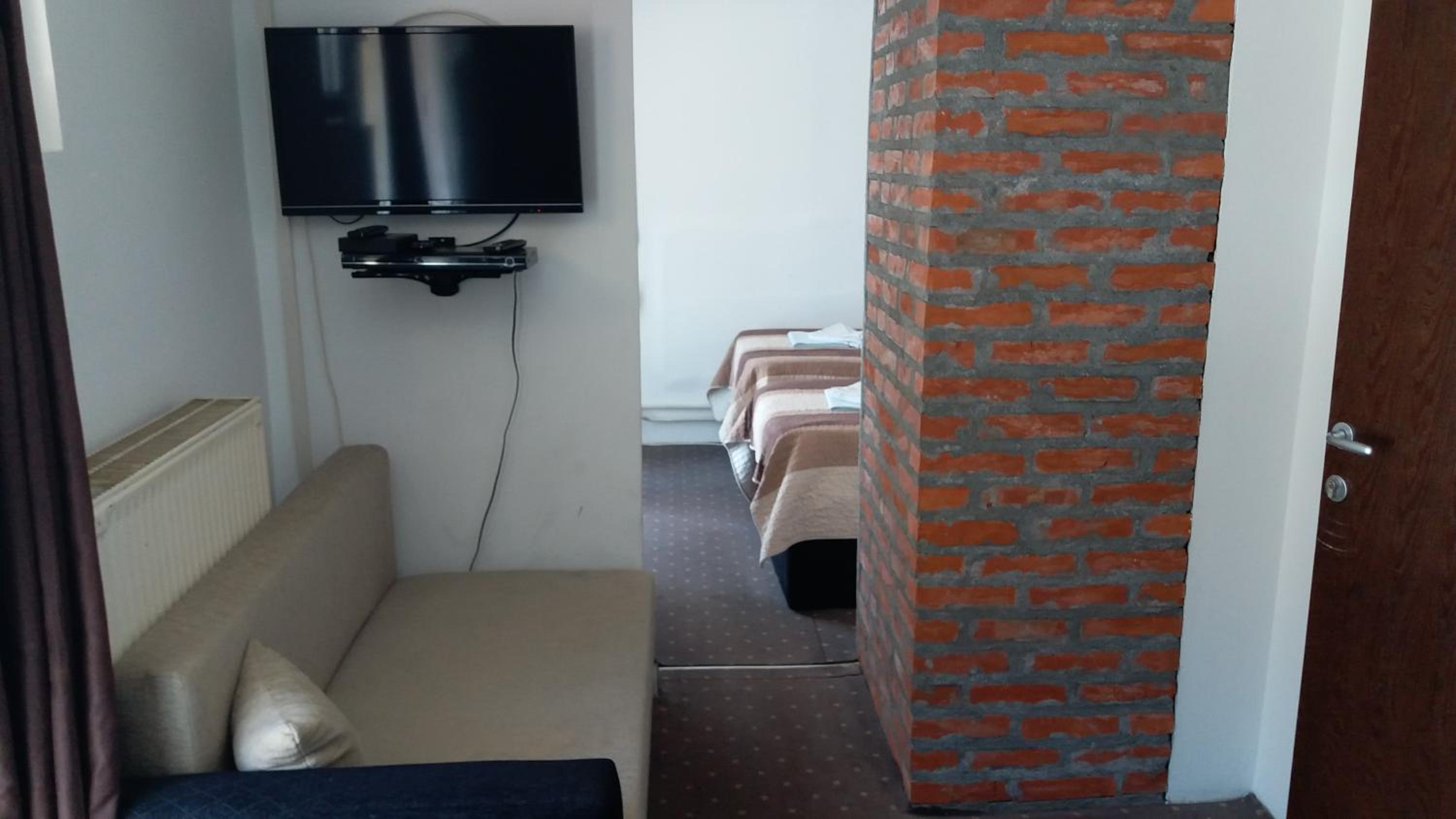 Standard Quadruple Room - Photo 7
