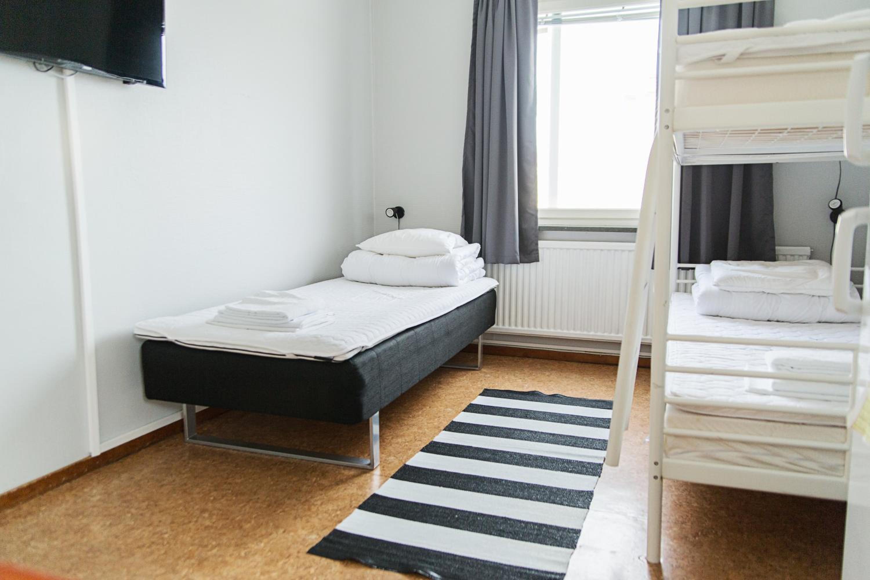 Economy Triple Room With Shared Bathroom
