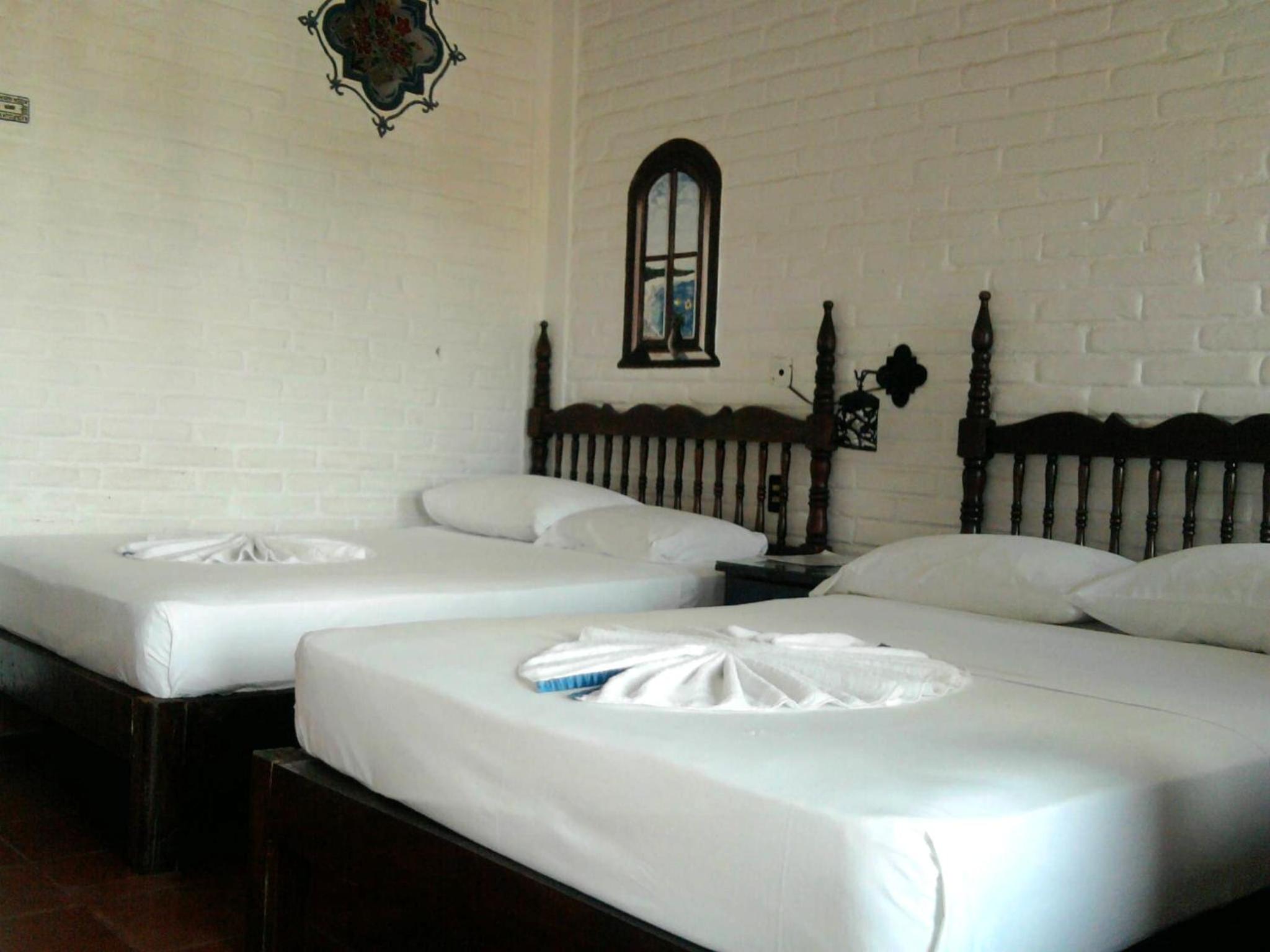 Double Room with Two Double Beds (1-4 Adults) photo 3