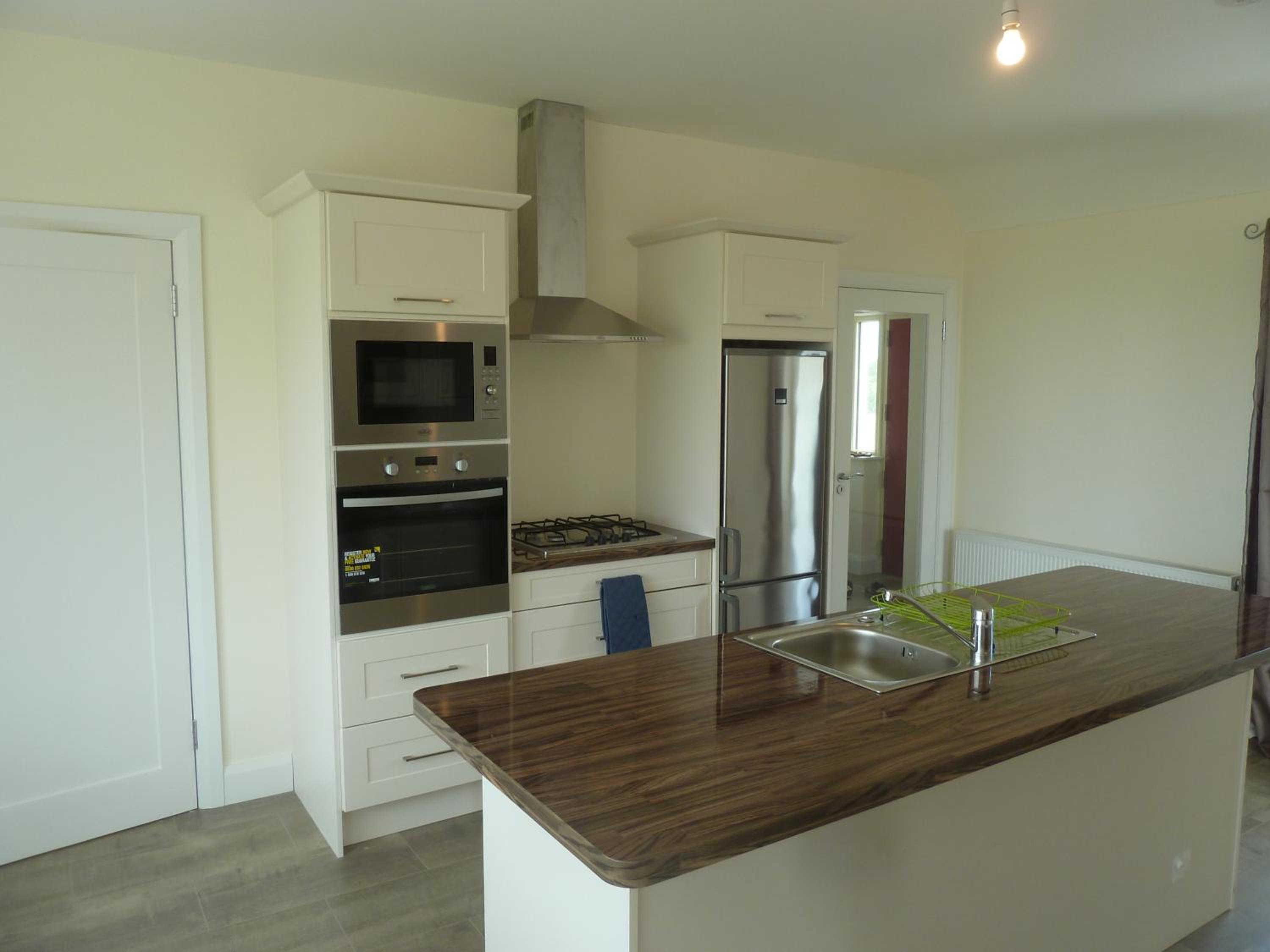 Three-Bedroom House photo 2