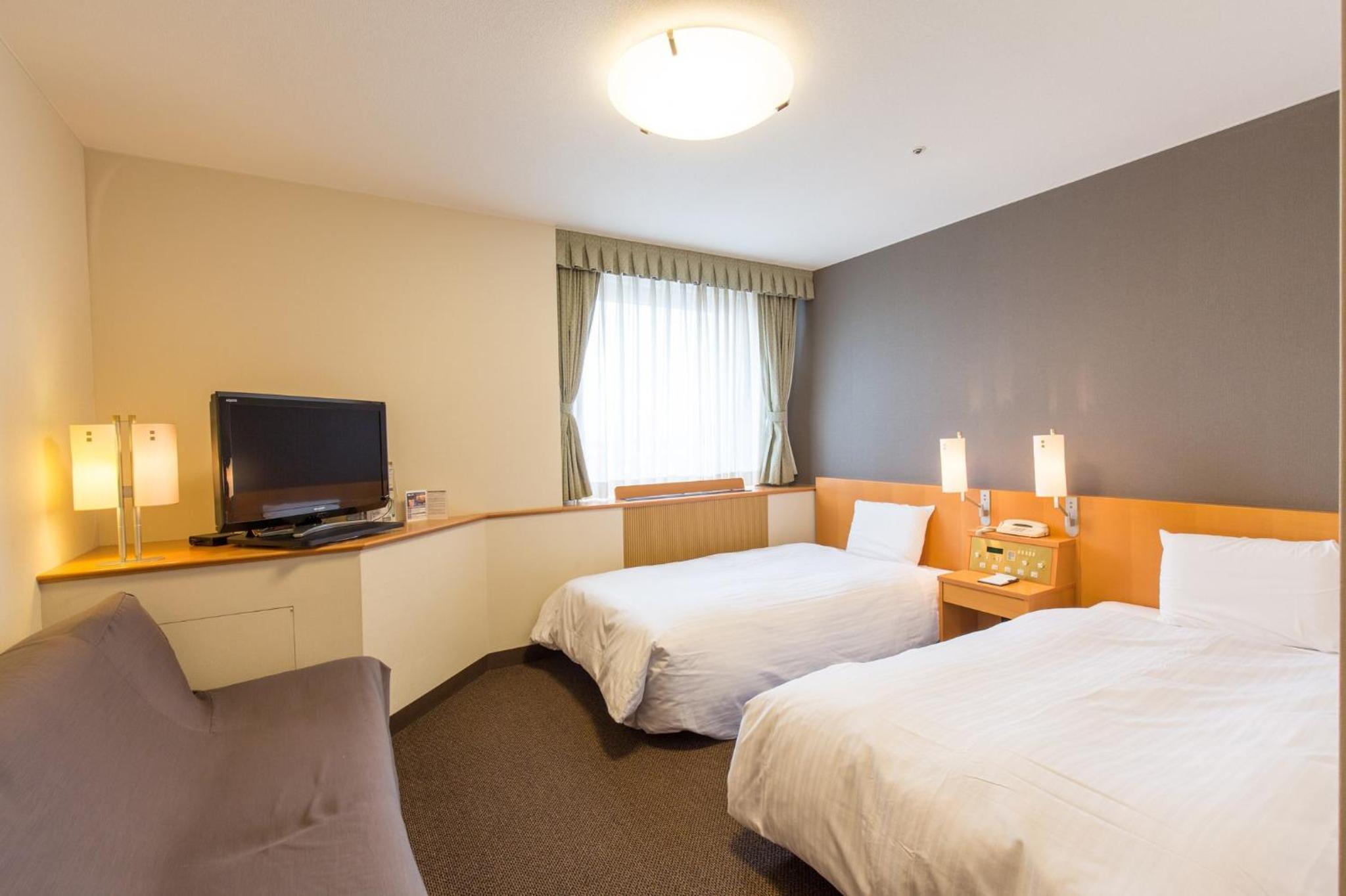 Twin Room - Non-Smoking - Photo 1