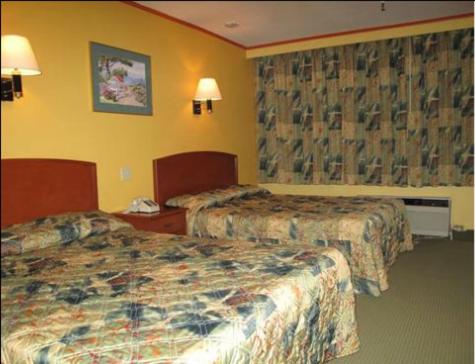 Queen Room with Two Queen Beds - Smoking photo 1