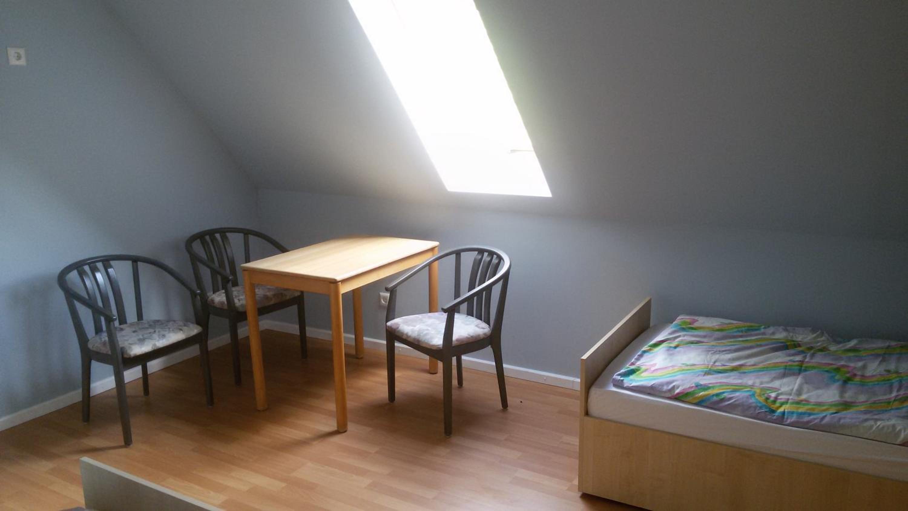 Basic Triple Room with Shared Bathroom photo 1
