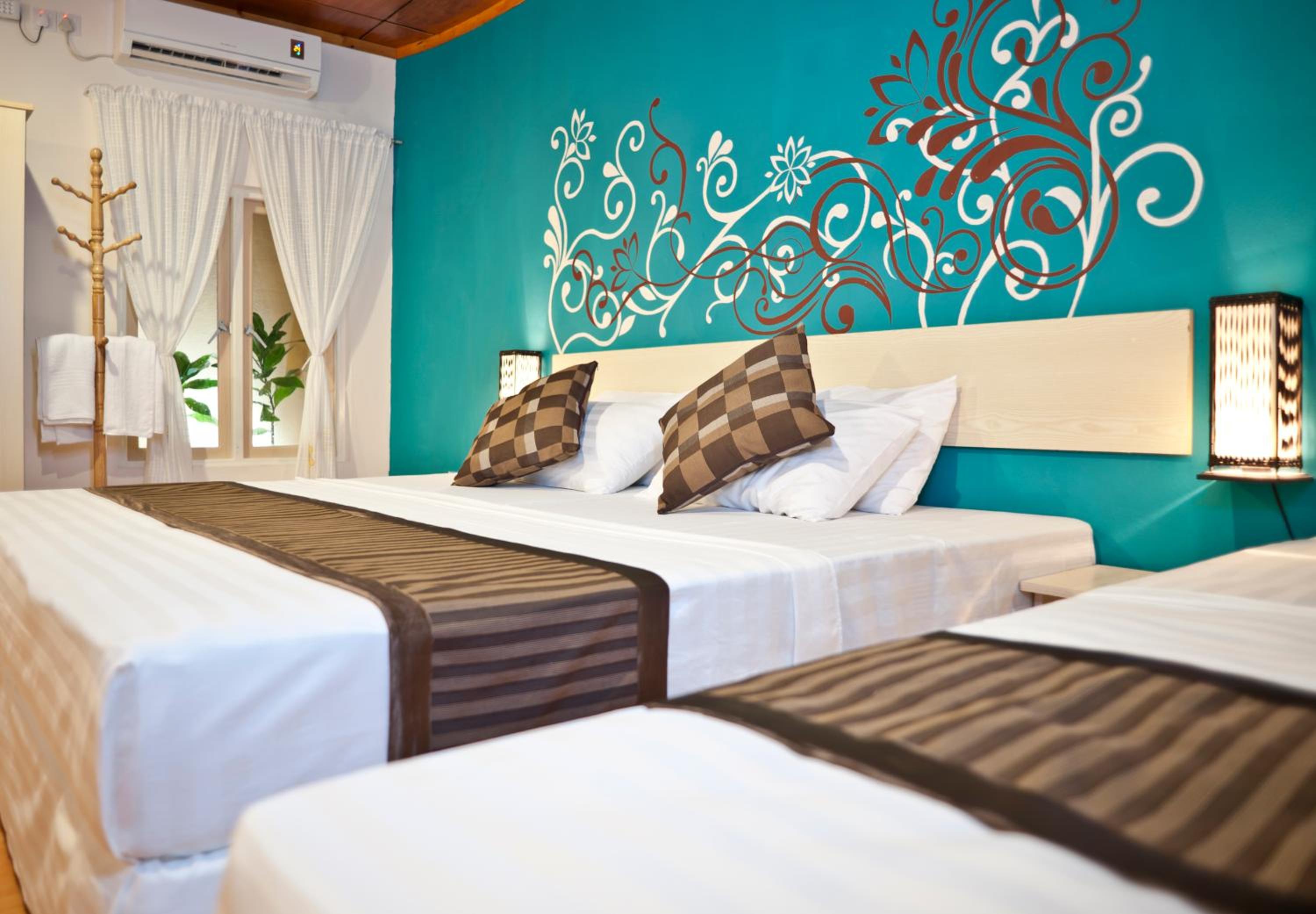 Deluxe Triple Room with Garden View
