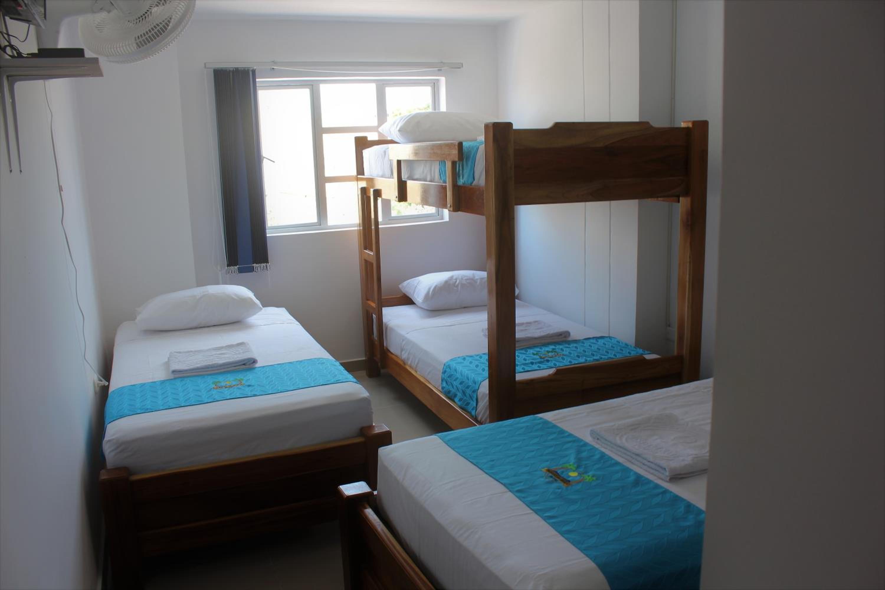 Quadruple Room with Private Bathroom photo 3