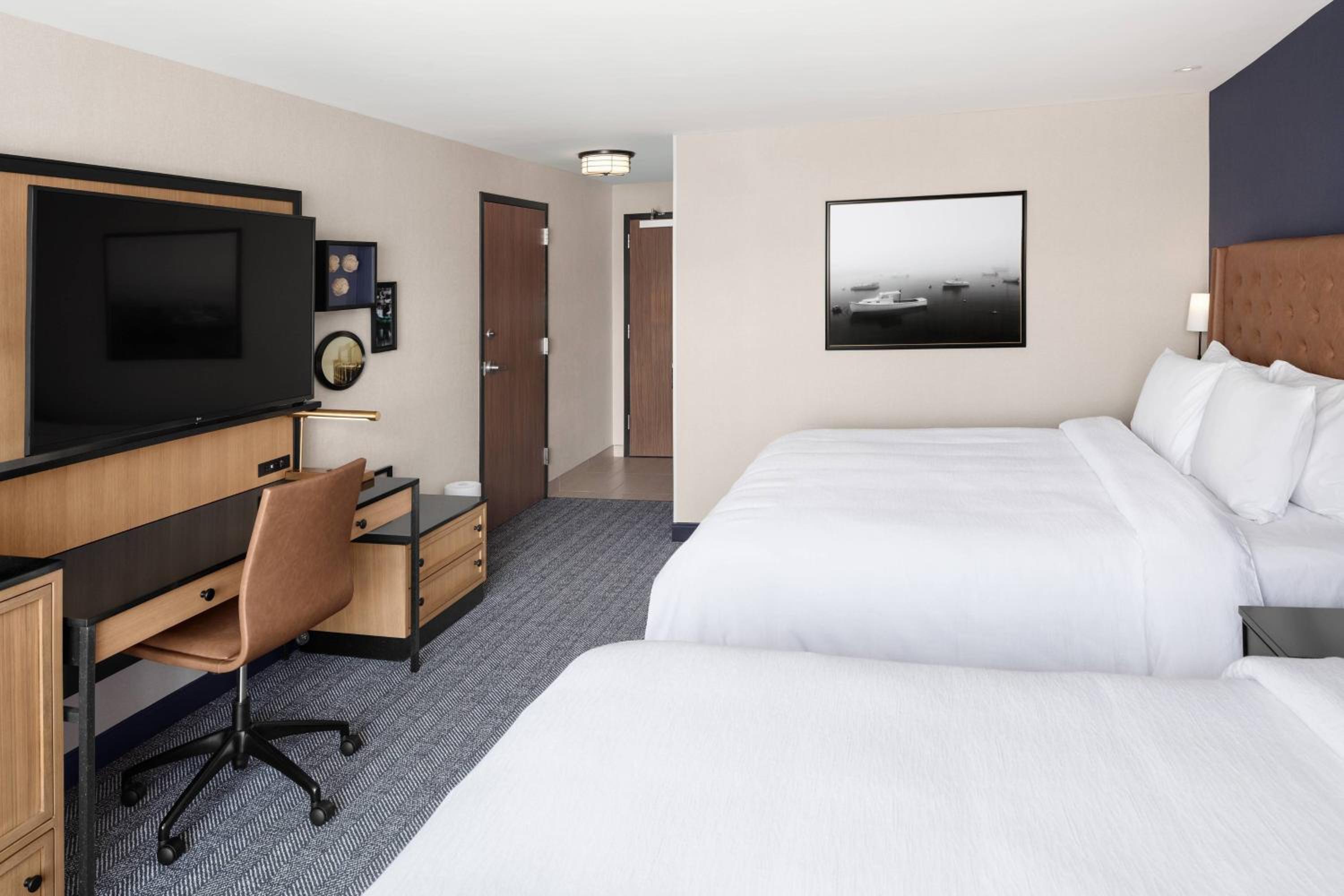 Room with Two King Beds and Sofa Bed