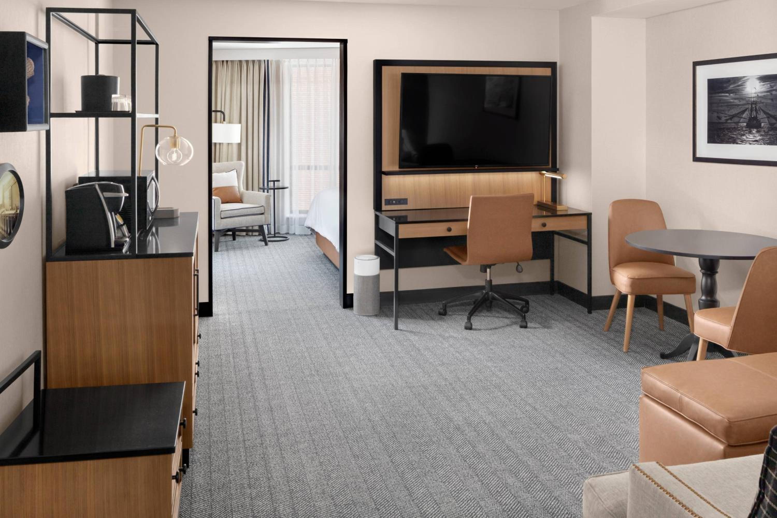 One-Bedroom King Suite with Roll-In Shower and Sofa Bed - Mobility Access