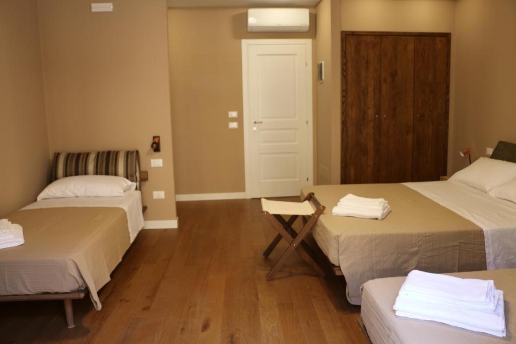 Deluxe Quadruple Room - Photo 8