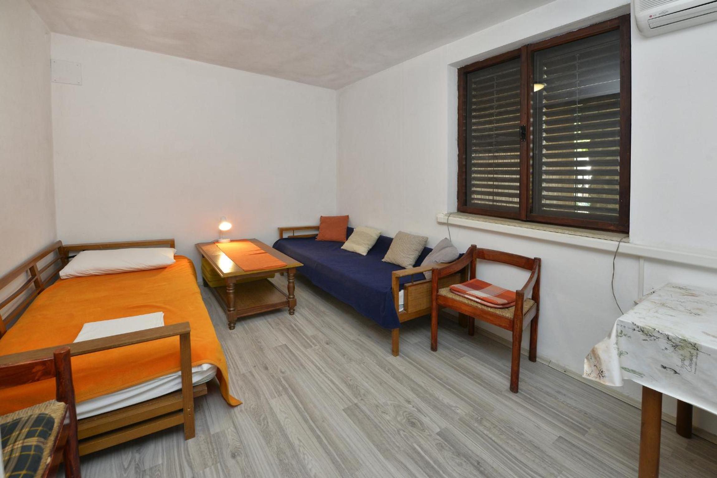 Three-Bedroom Apartment - Photo 8