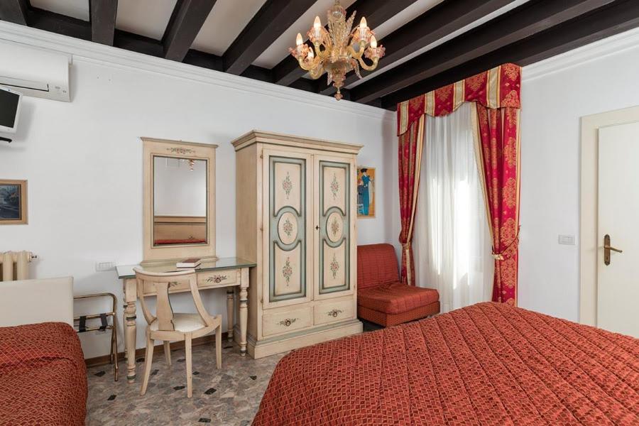 Quadruple Room - Photo 1