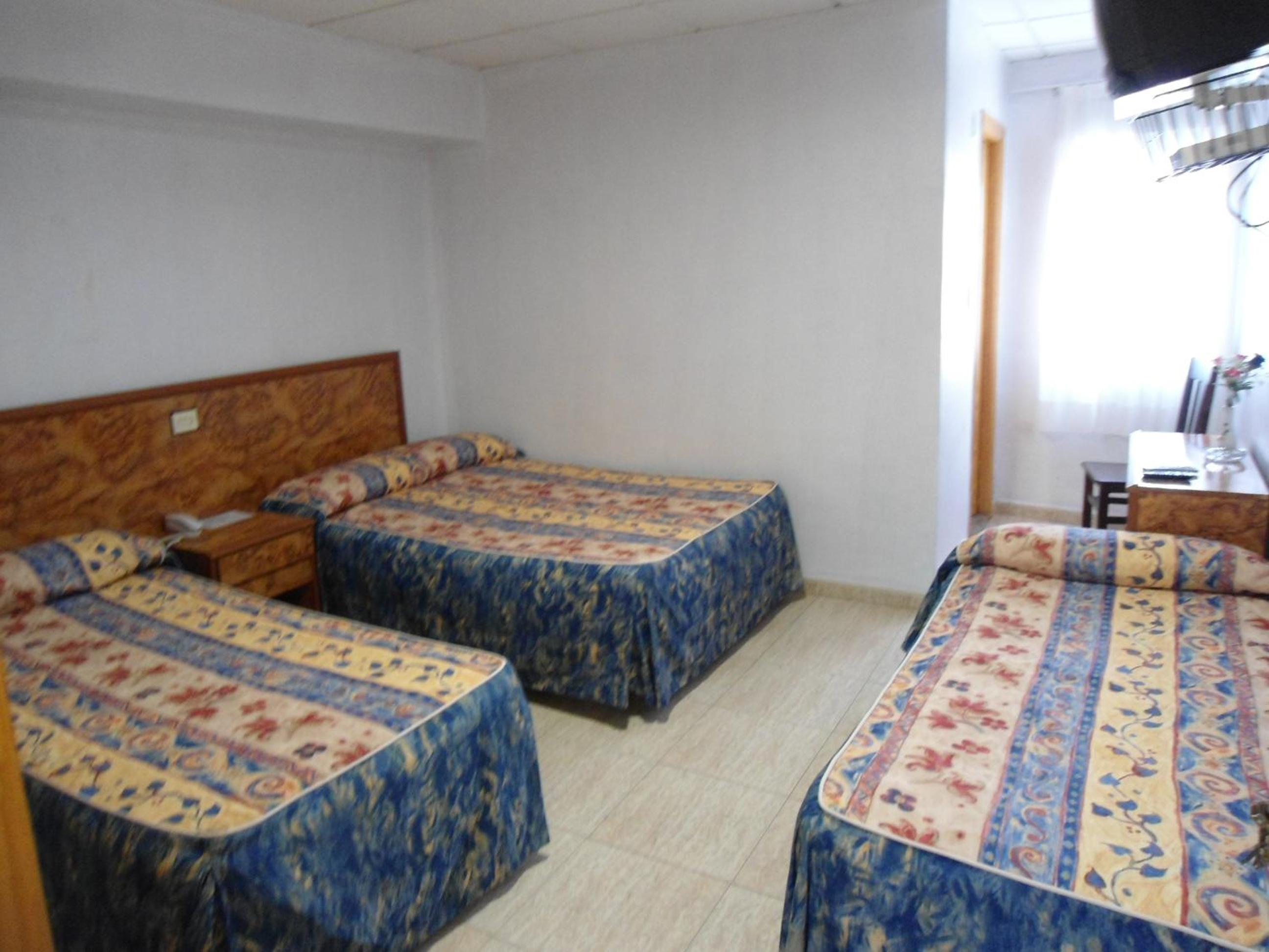 Triple Room (2 Adults + 1 Child) photo 3
