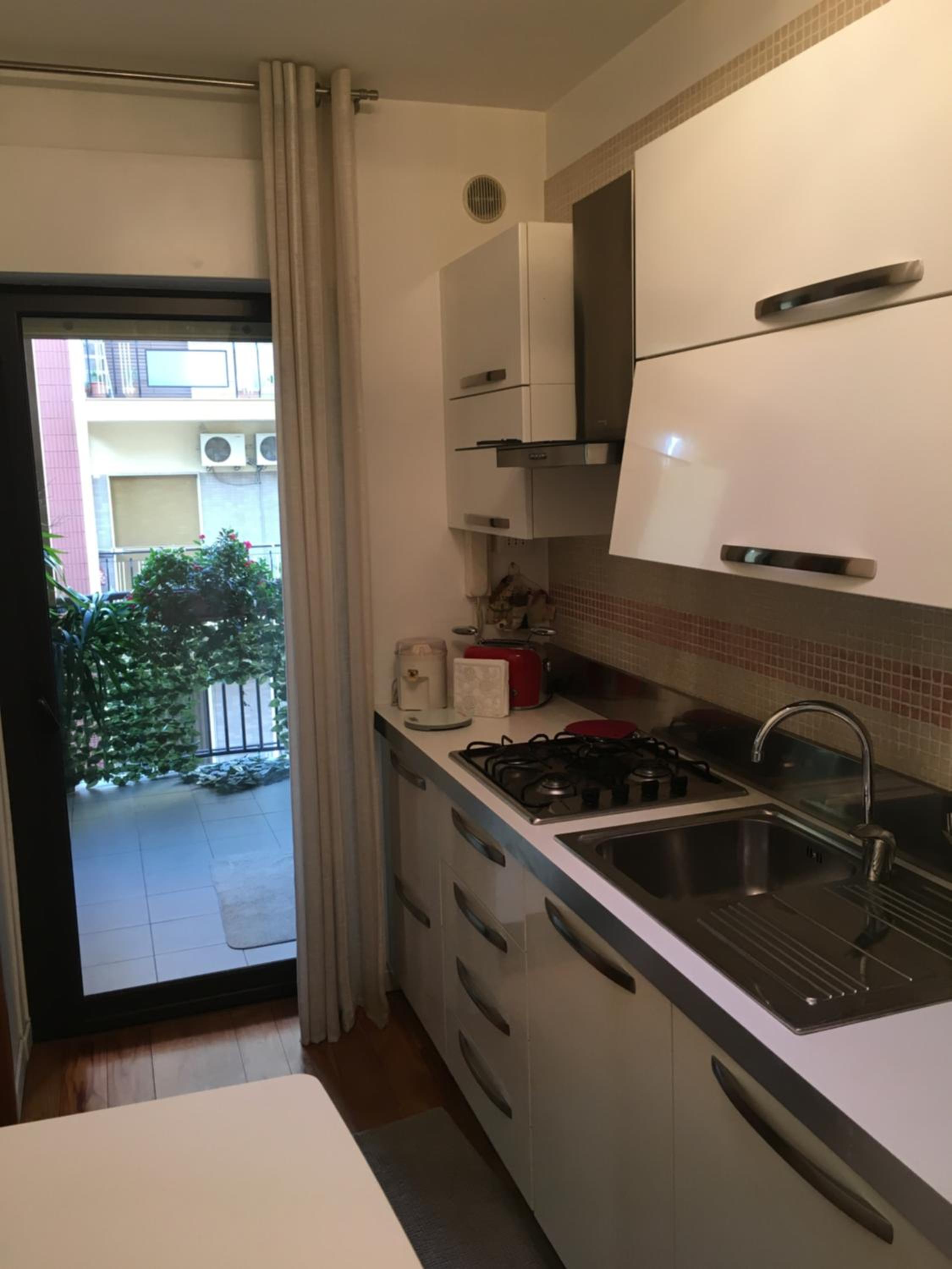 Apartment with Balcony - Photo 19