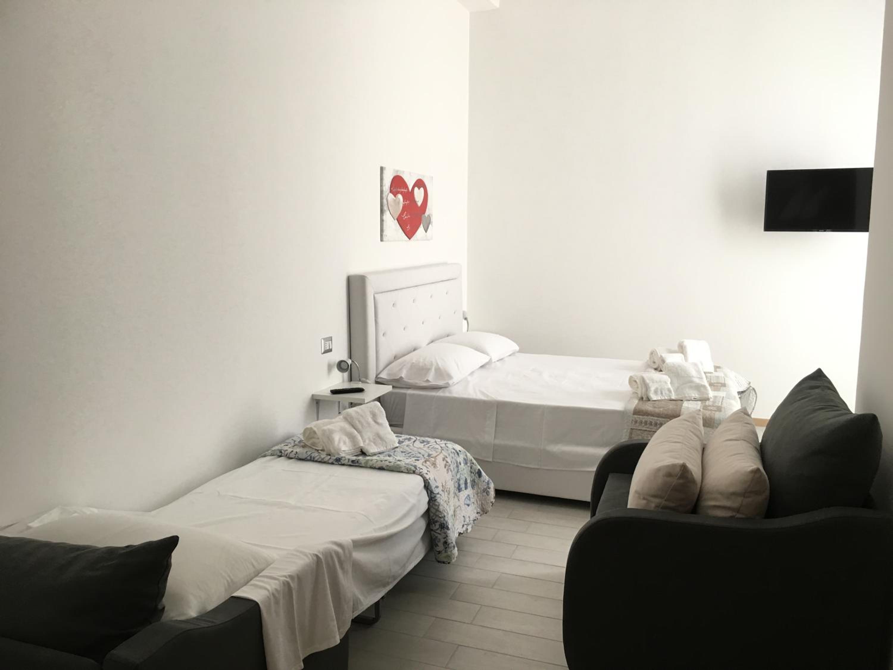 Quadruple Room with Private Bathroom photo 1