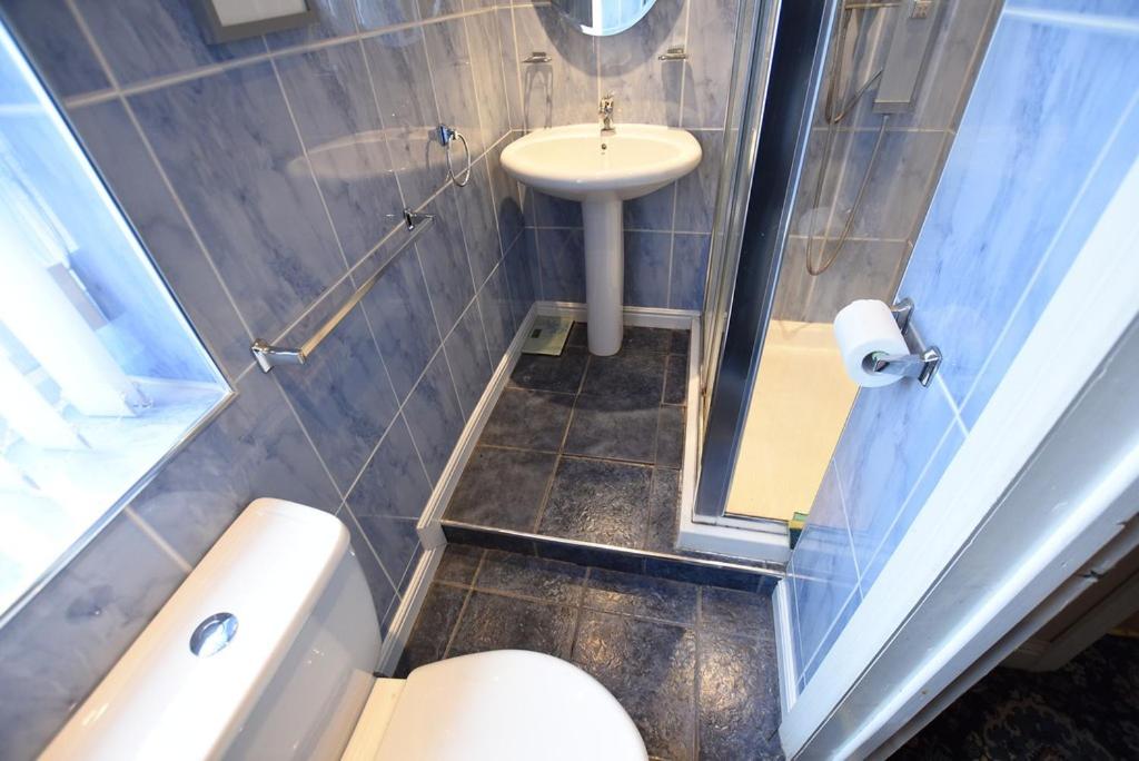 Three-Bedroom House - Photo 19