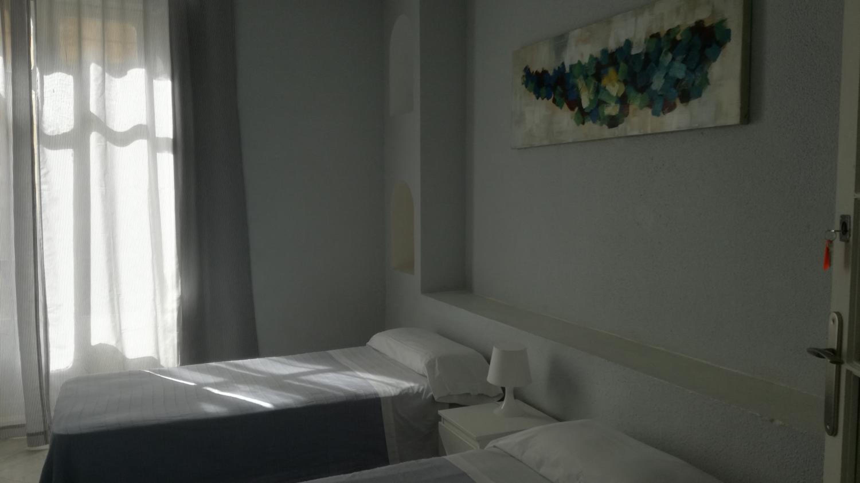 Habitación Doble con Baño Compartido