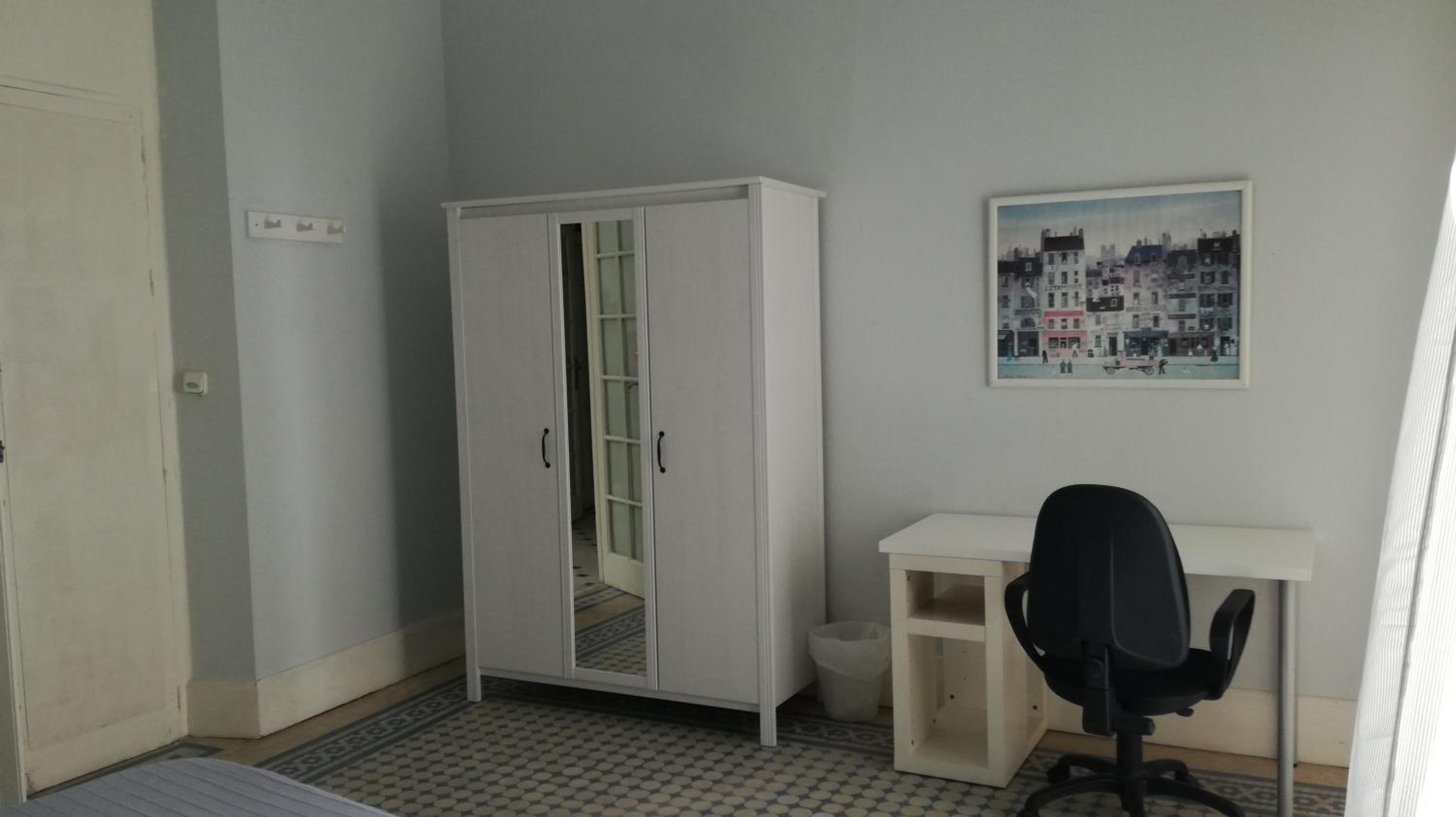 Habitación Triple con Baño Compartido