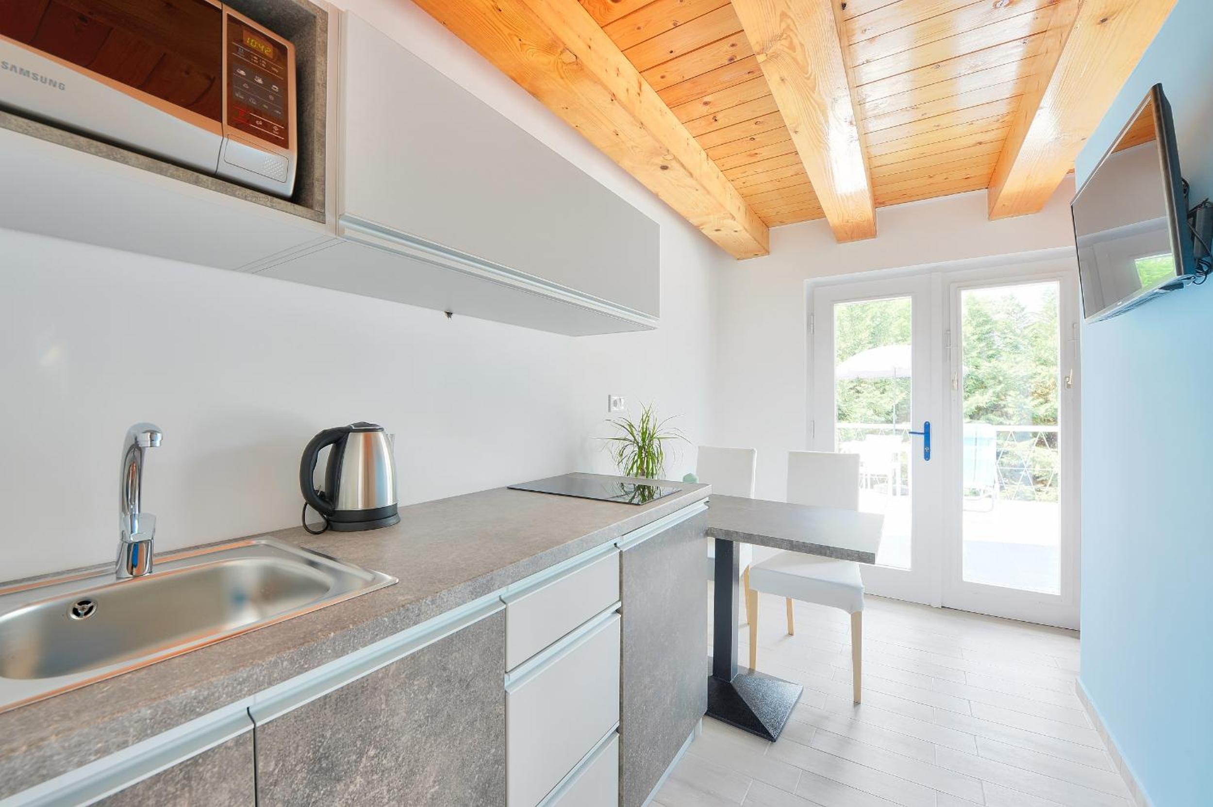 Studio Apartment with Balcony - Split Level photo 3