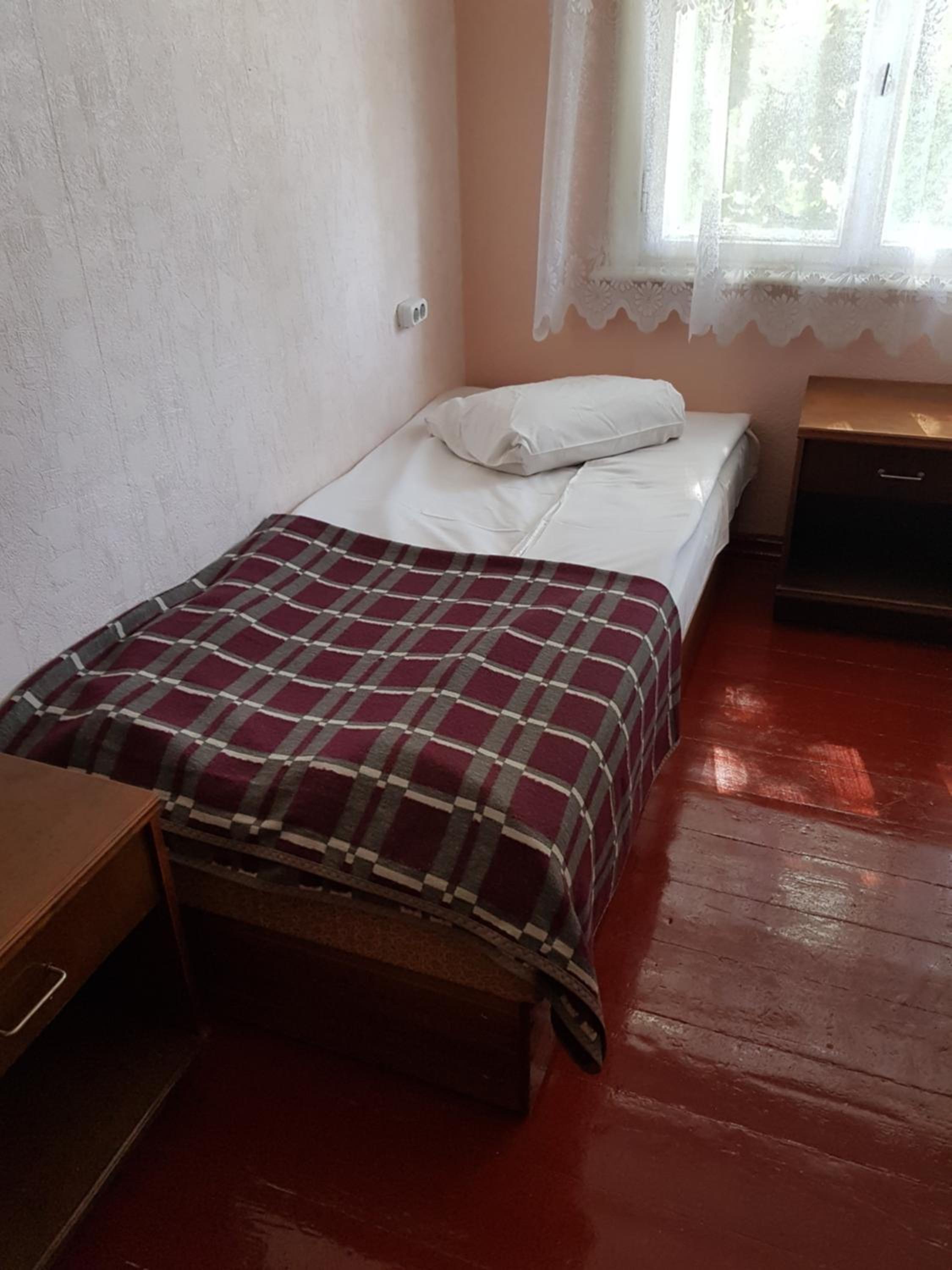 Single Bed In Male Dormitory Room With Shared Bathroom photo 1