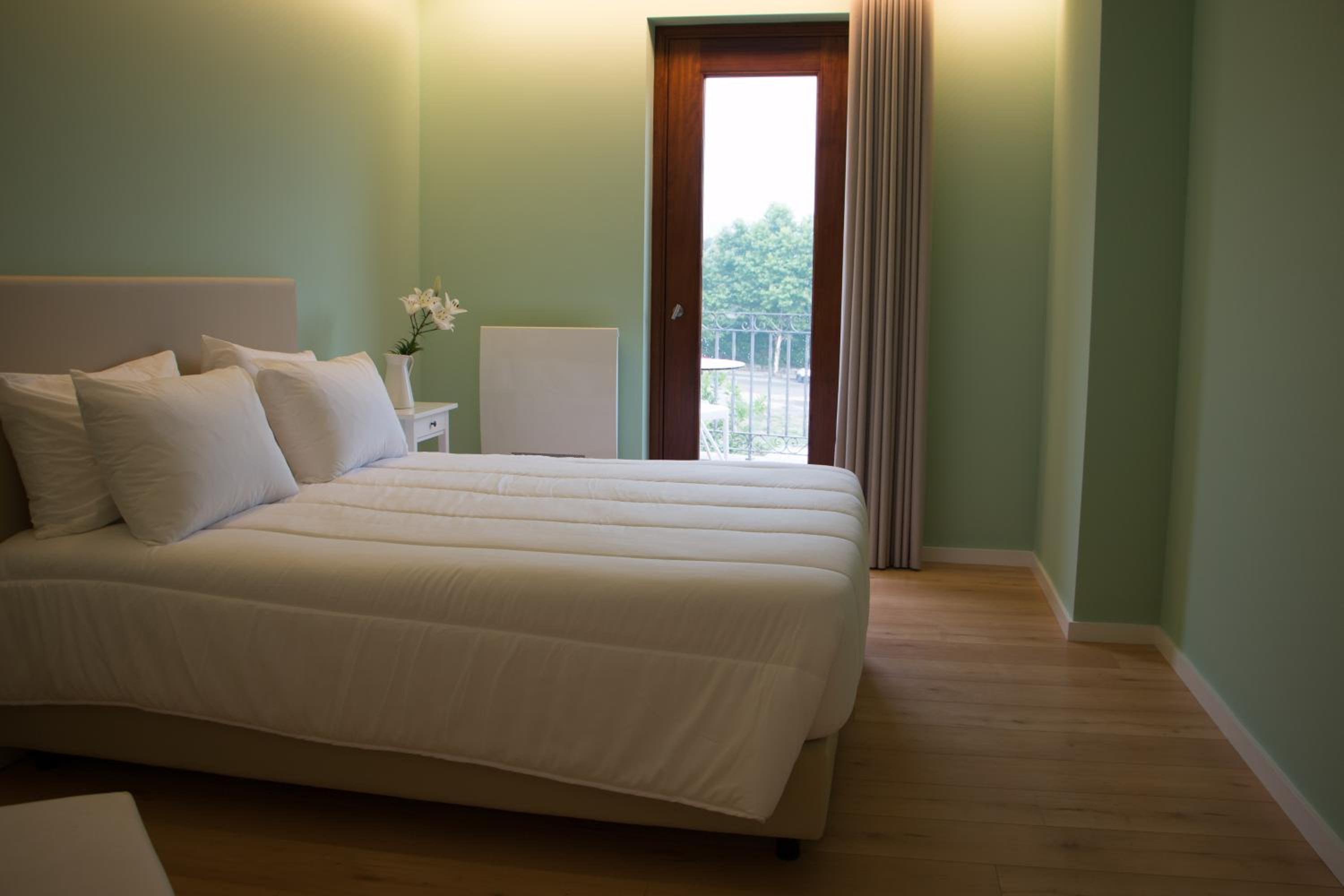 Deluxe Double Room with Balcony - Photo 1