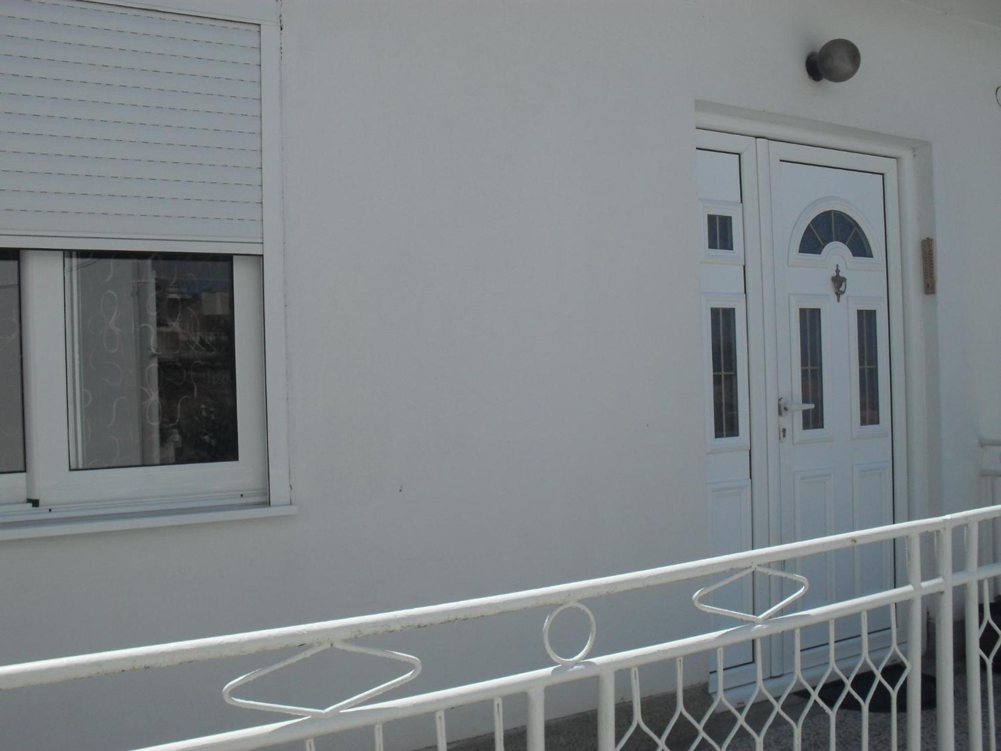 Three-Bedroom Apartment with Balcony and Sea View