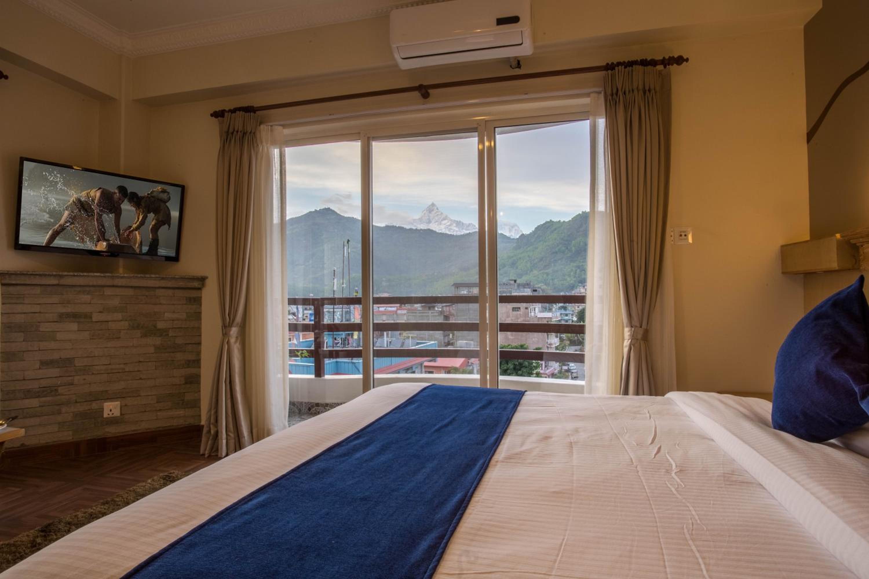 Super Deluxe Double Room- Lake/Mountain Facing photo 2