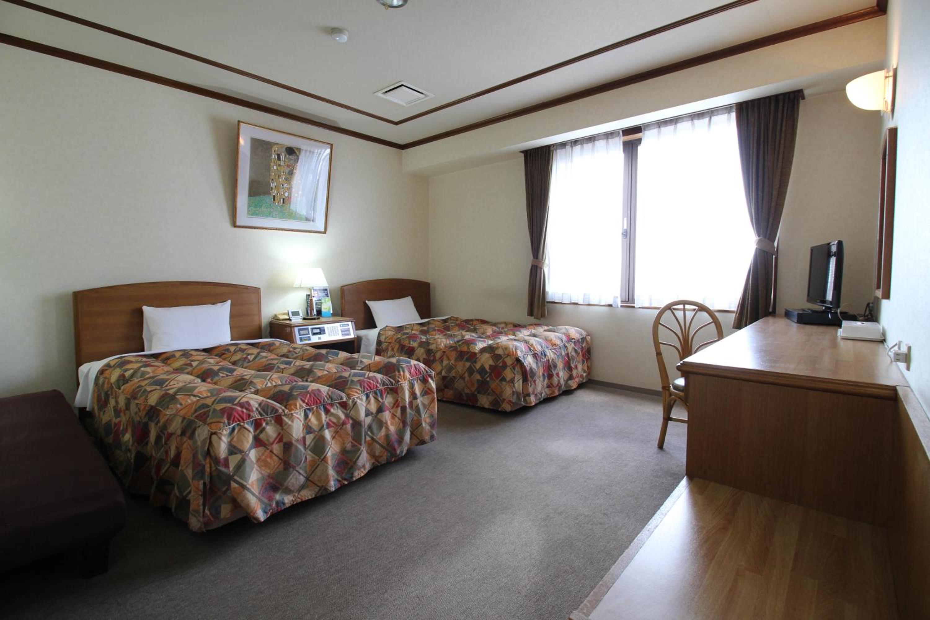 Twin Room - Non-Smoking - Photo 1