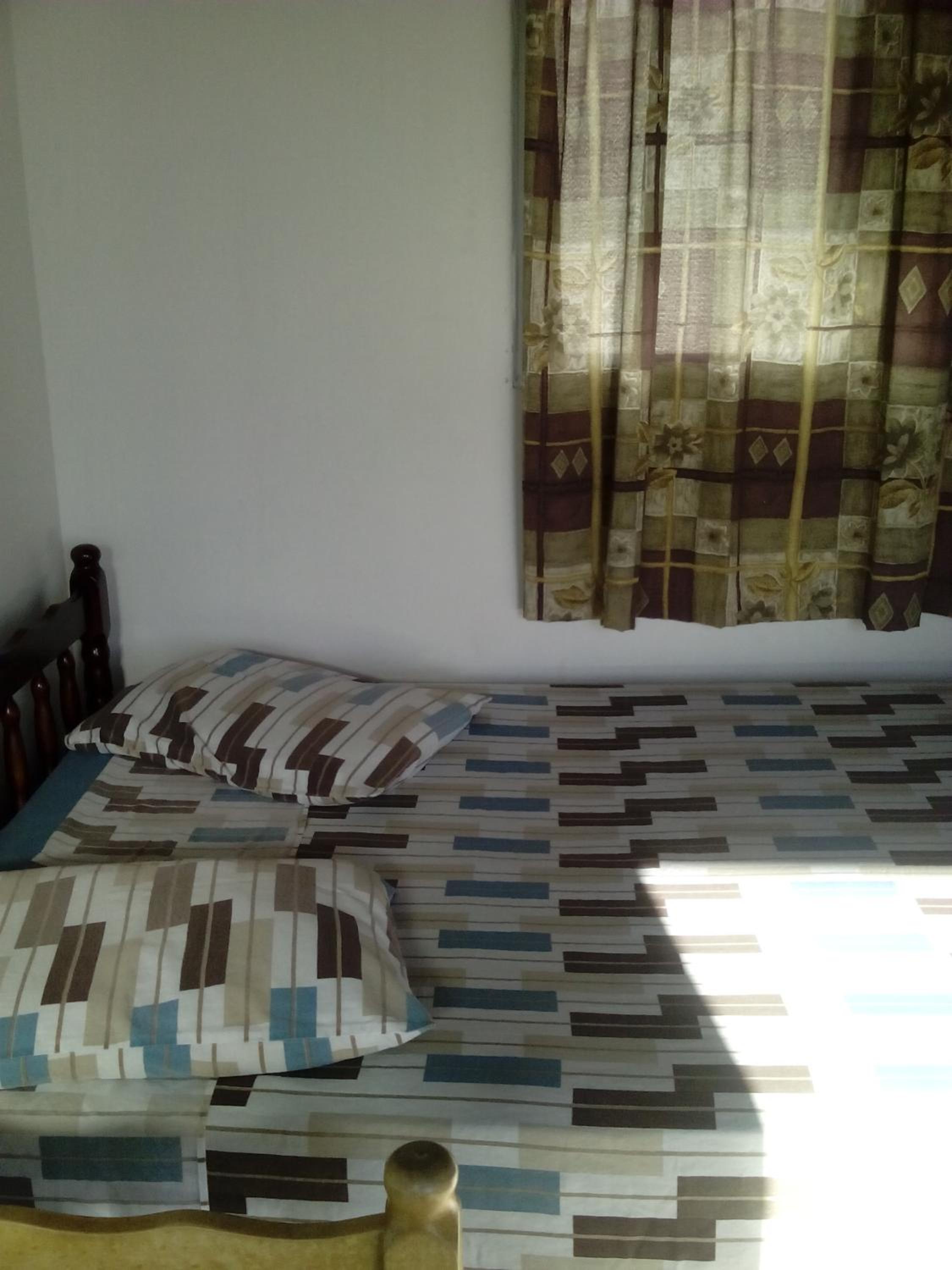 Economy Triple Room photo 3