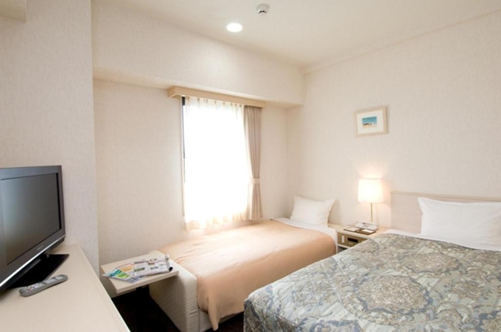 Economy Twin Room - Smoking - Photo 2
