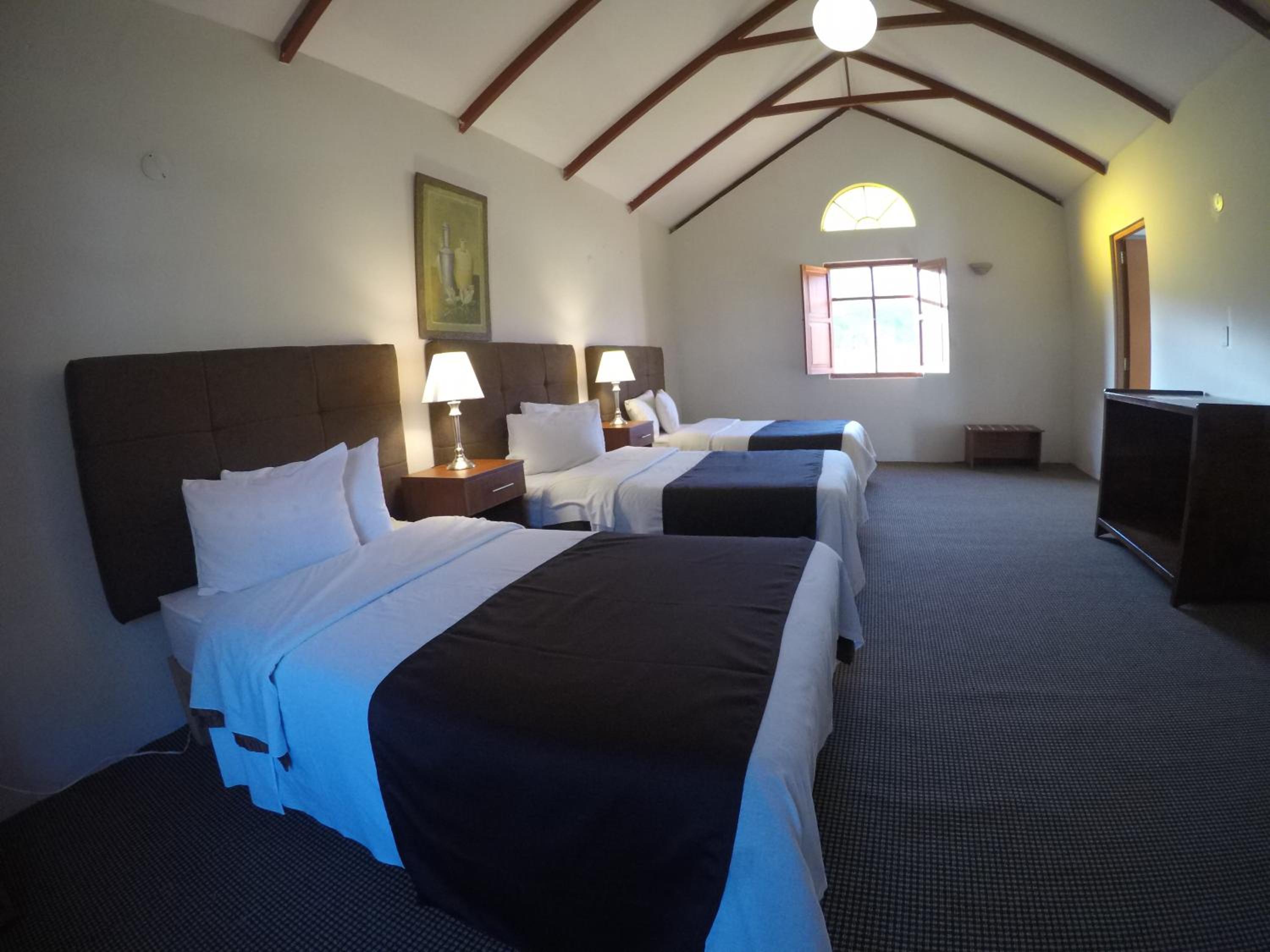 Deluxe Triple Room