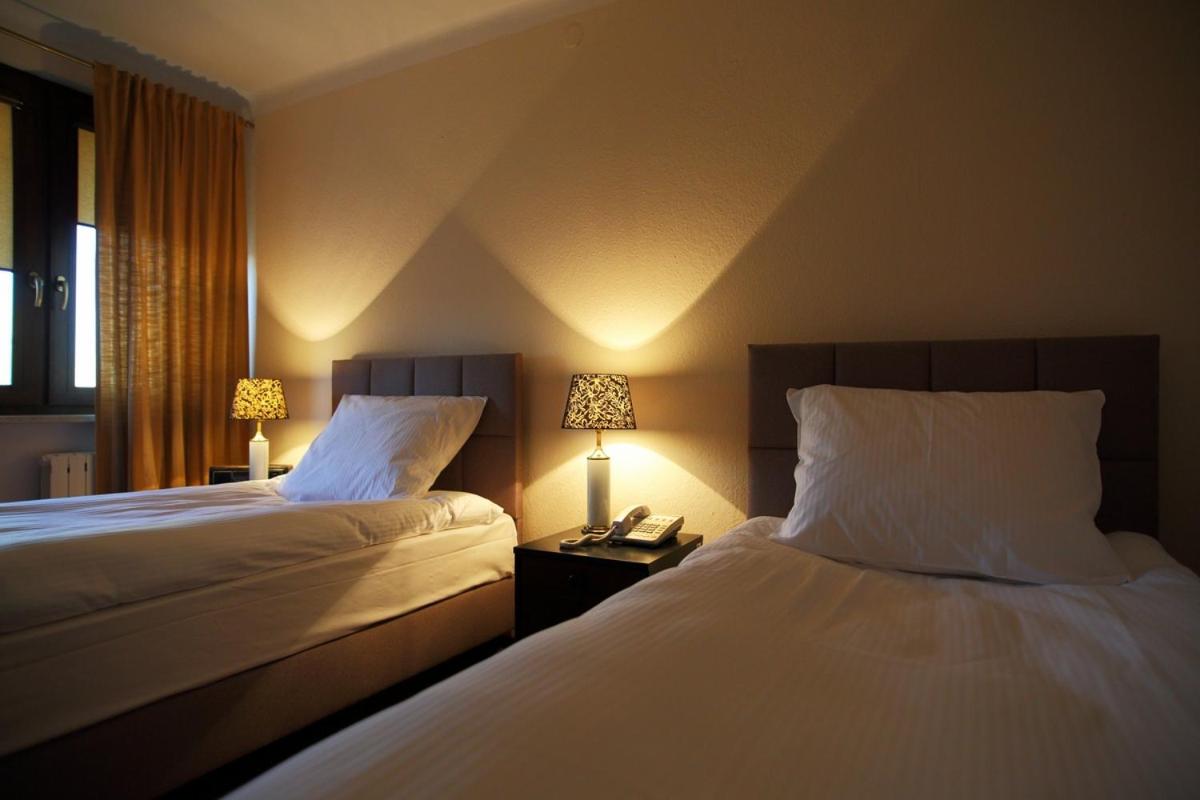 Standard Twin Room - Photo 1