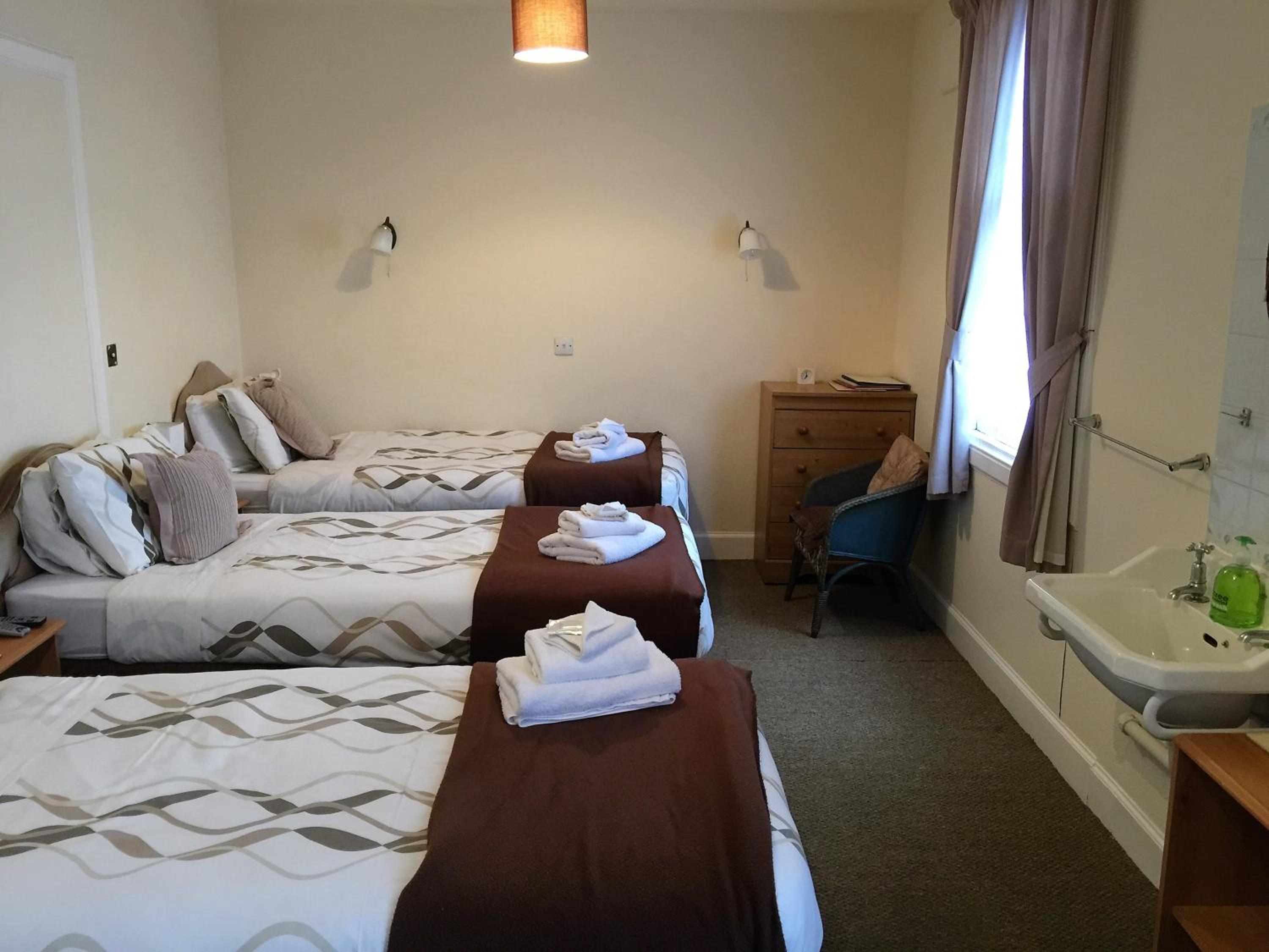 Economy Triple Room with Shared Bathroom photo 1
