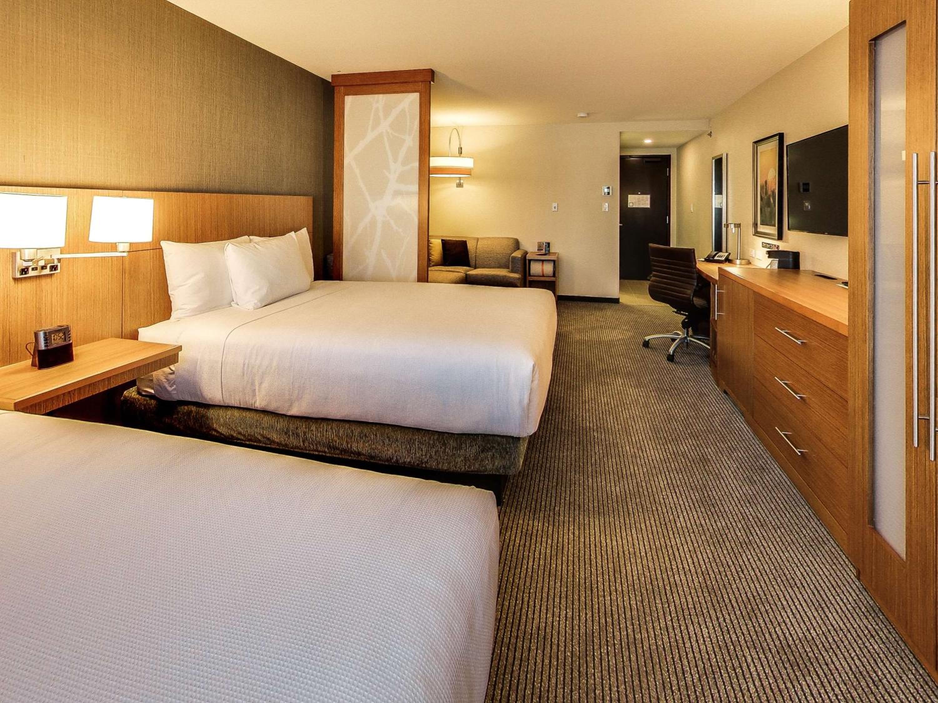 Queen Room with Two Queen Beds and Sofa Bed photo 1