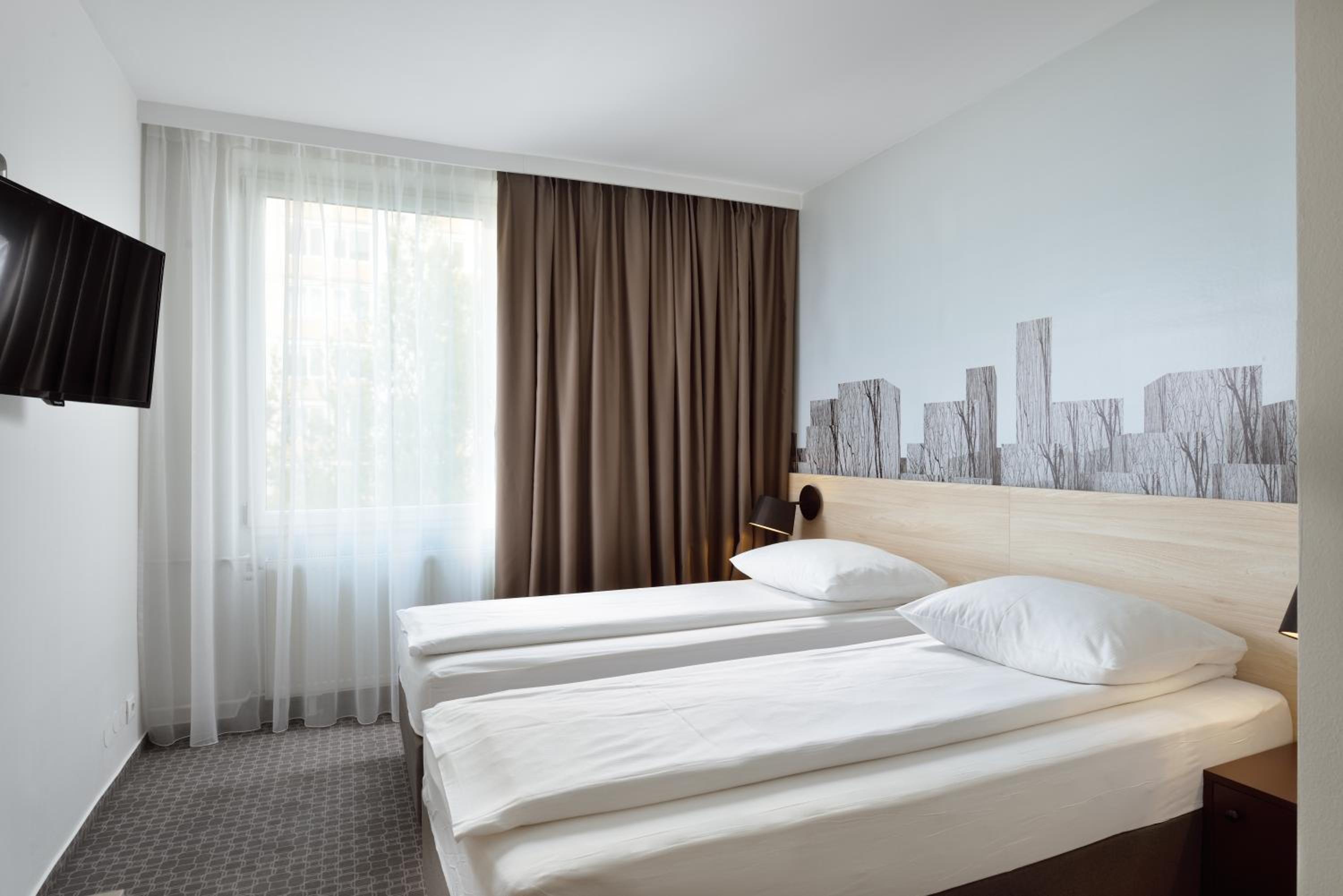 Twin Room - Photo 1