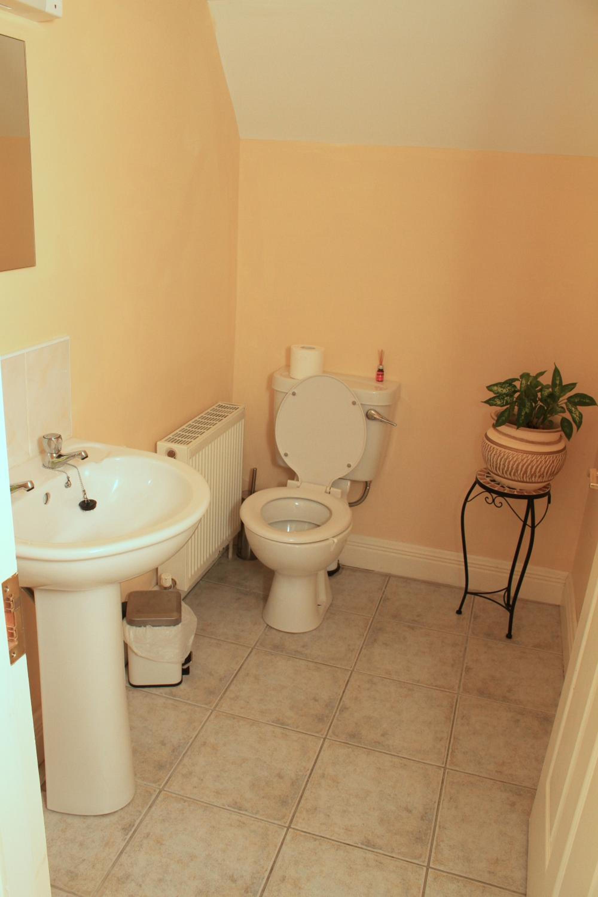 Three-Bedroom House - Photo 25