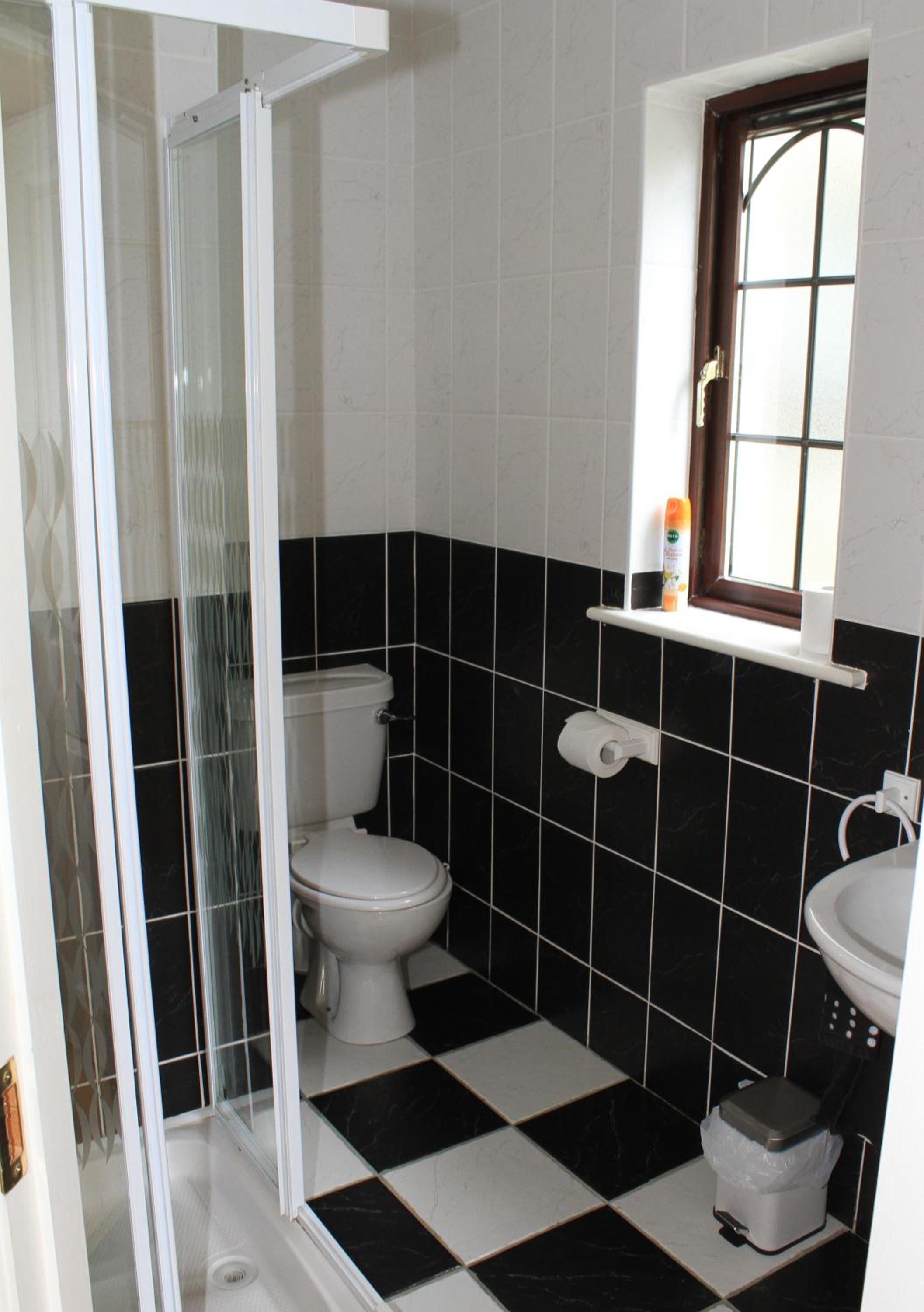 Three-Bedroom House - Photo 26