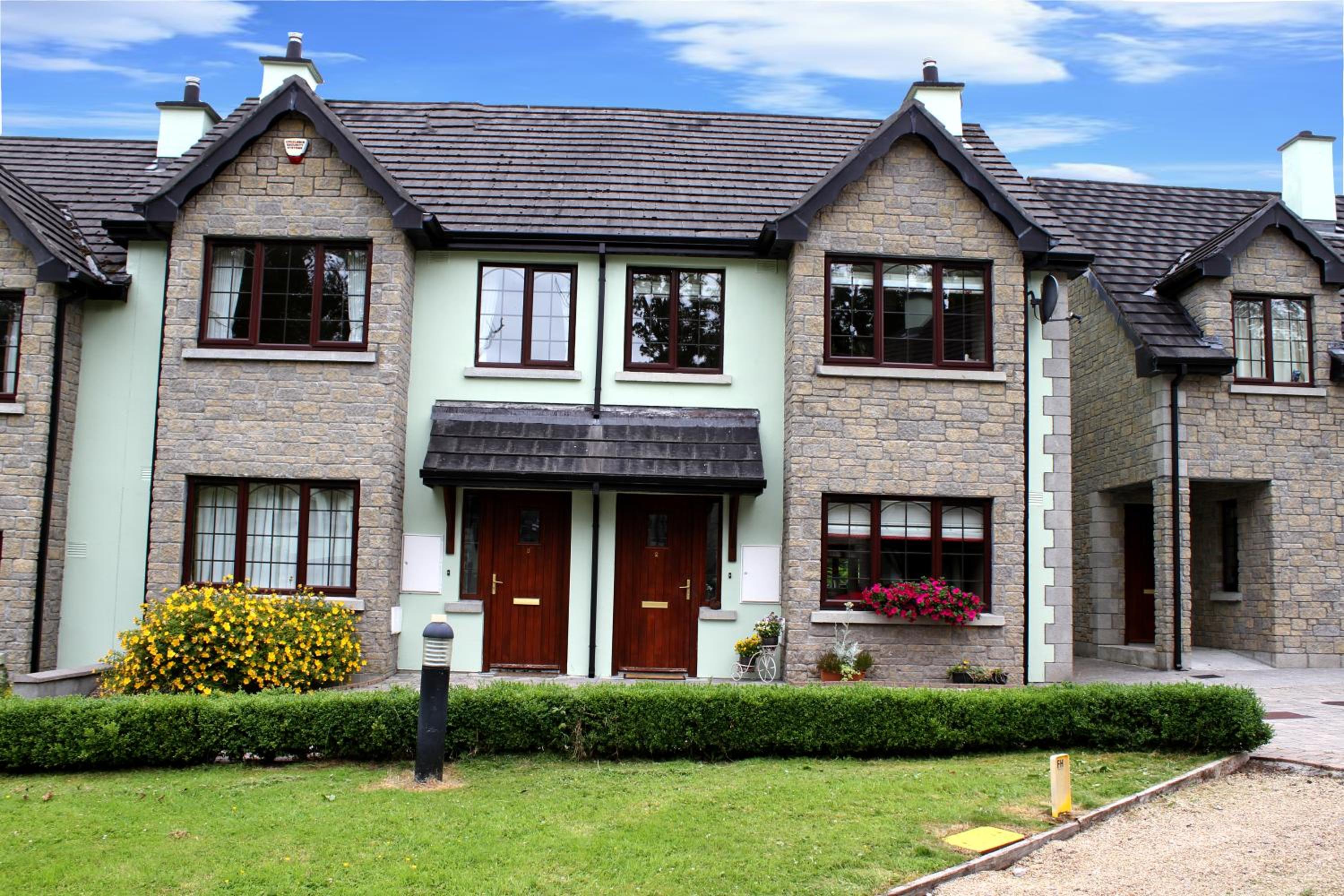 Three-Bedroom House - Photo 28