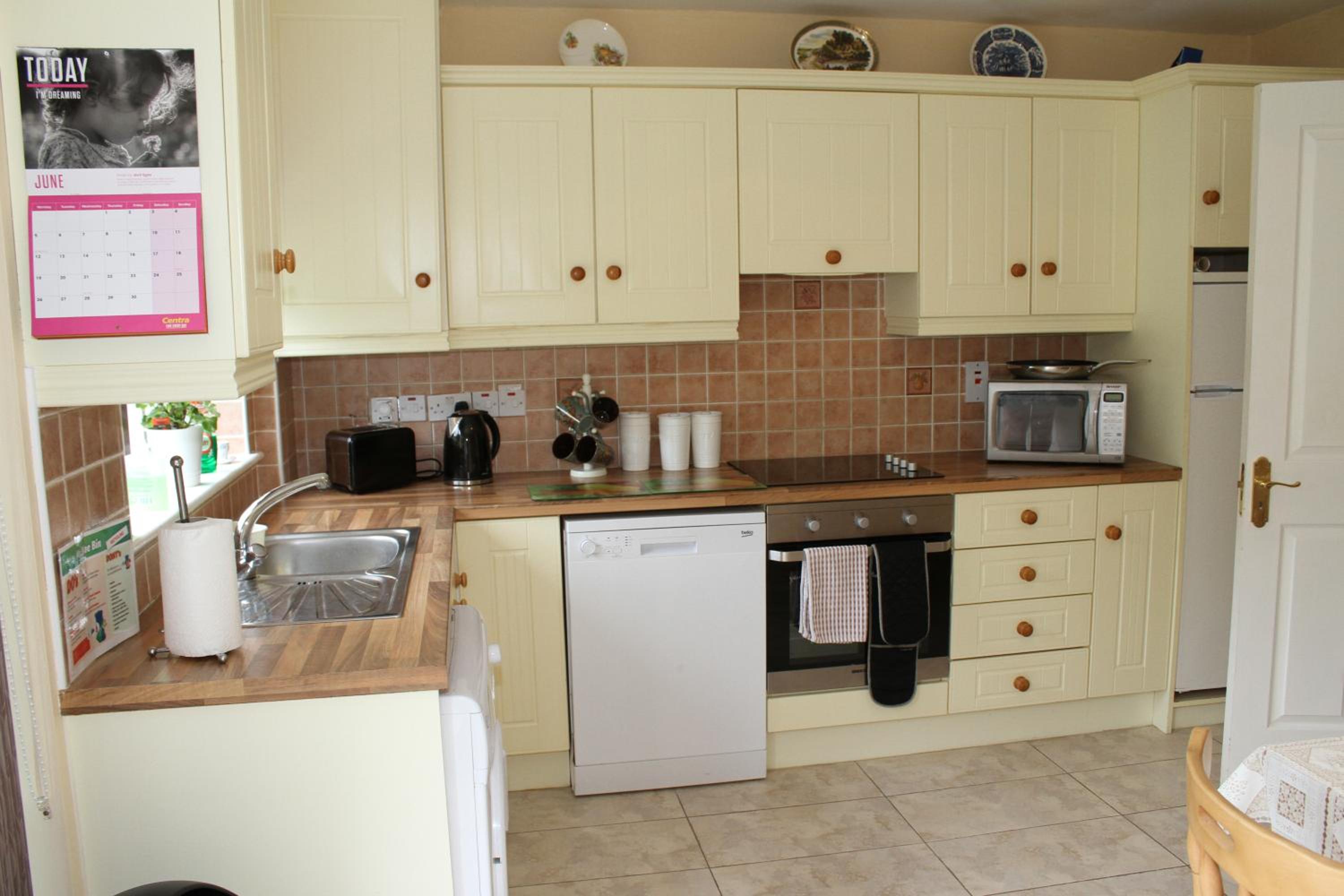 Three-Bedroom House - Photo 29