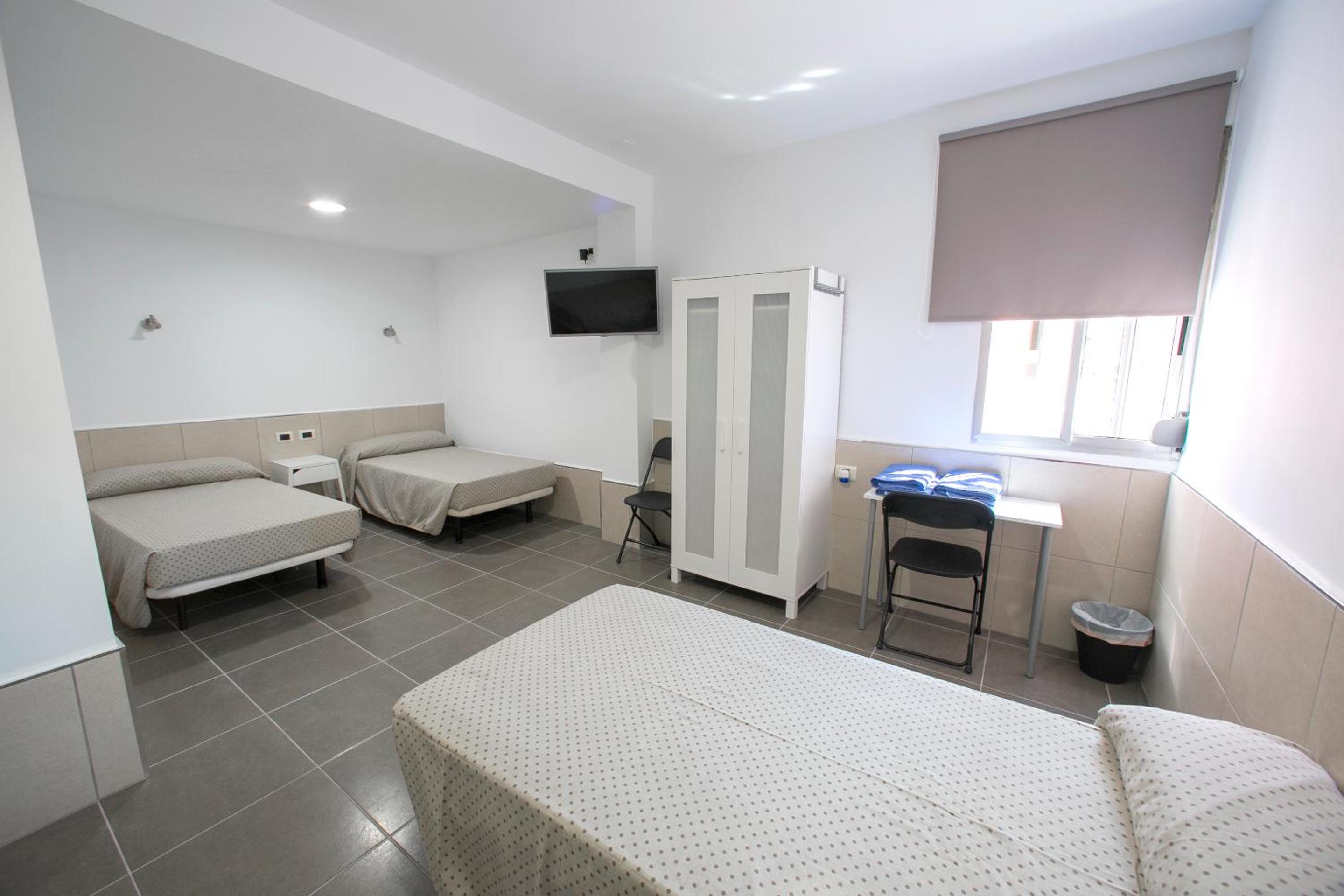 Habitación Cuádruple con Baño Compartido