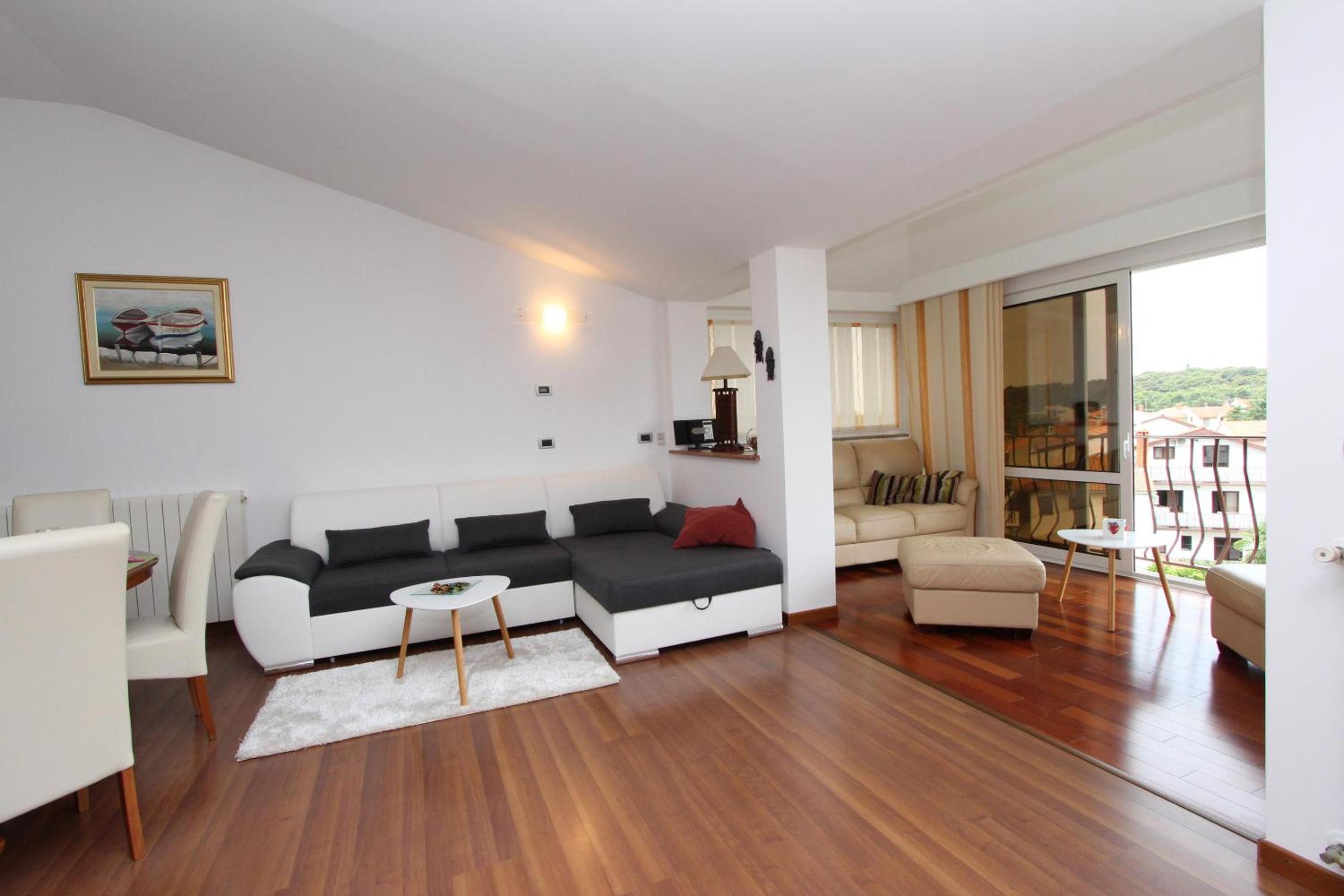 Three-Bedroom Apartment with Balcony