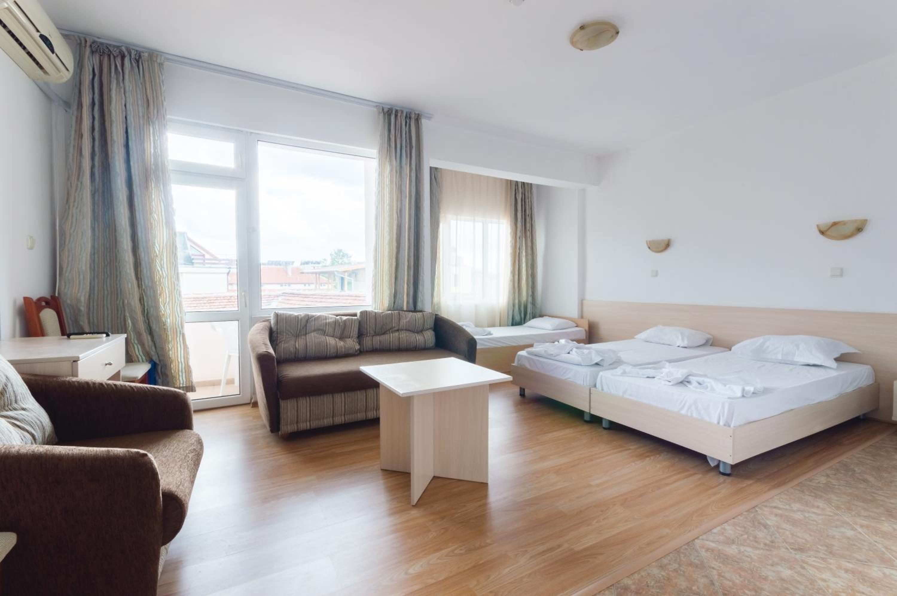 Quadruple Room with Balcony (2 Adults +2 Children)
