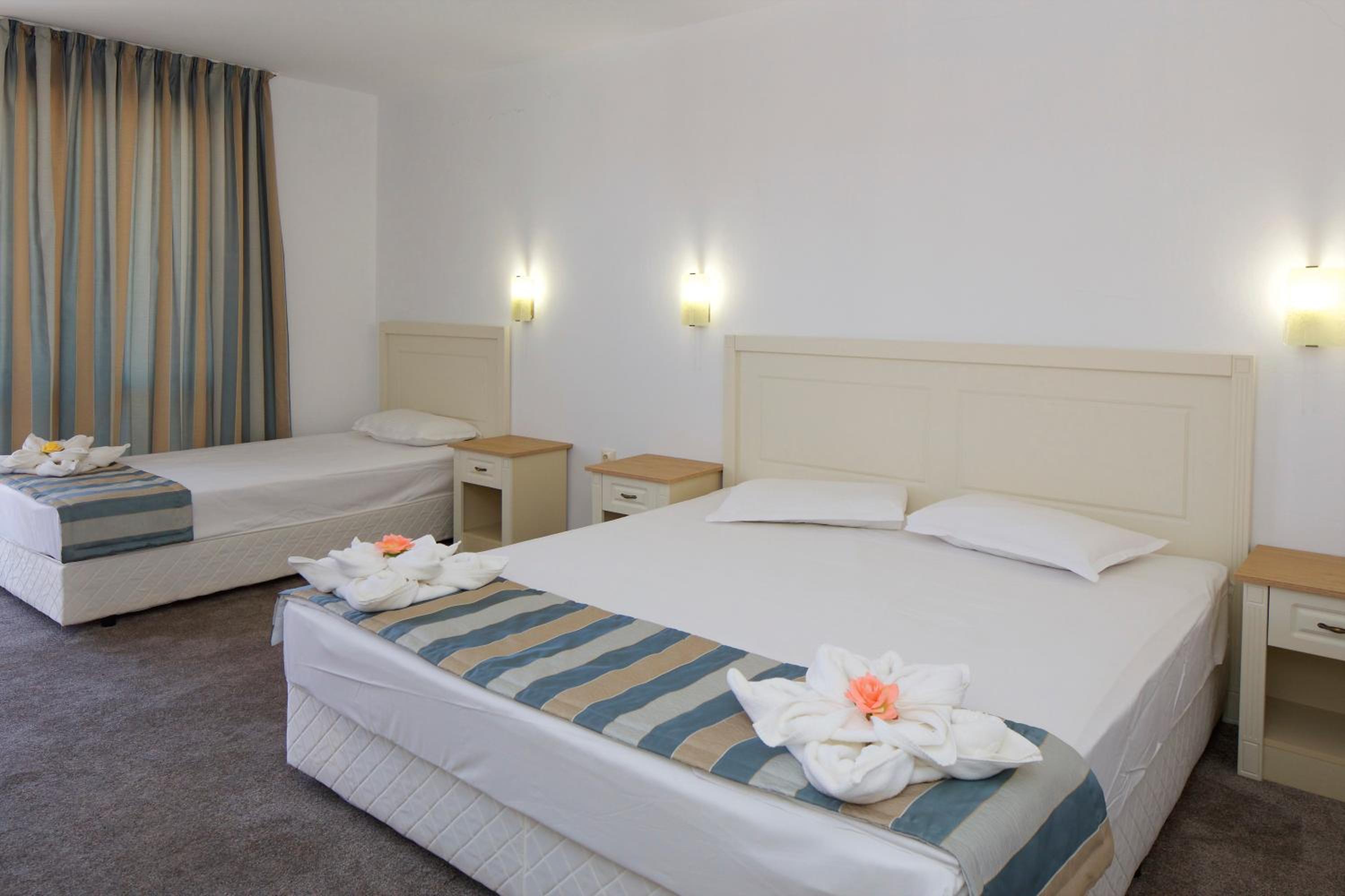 Deluxe Family Room with Balcony ( 3 Adults +1 Child) photo 2