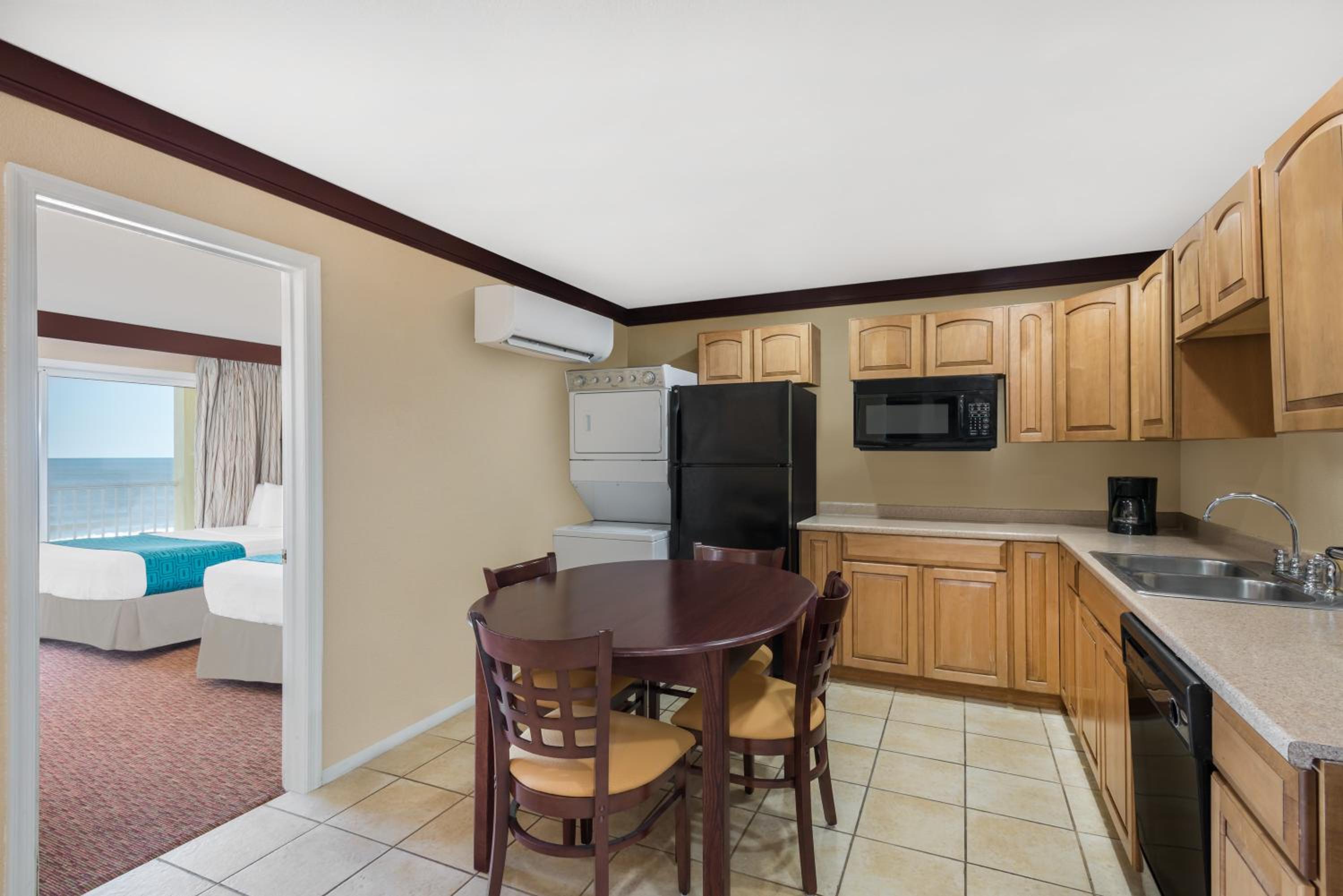 Two-Bedroom Oceanfront Suite with One King Bed and Two Double Beds - Non-Smoking photo 2