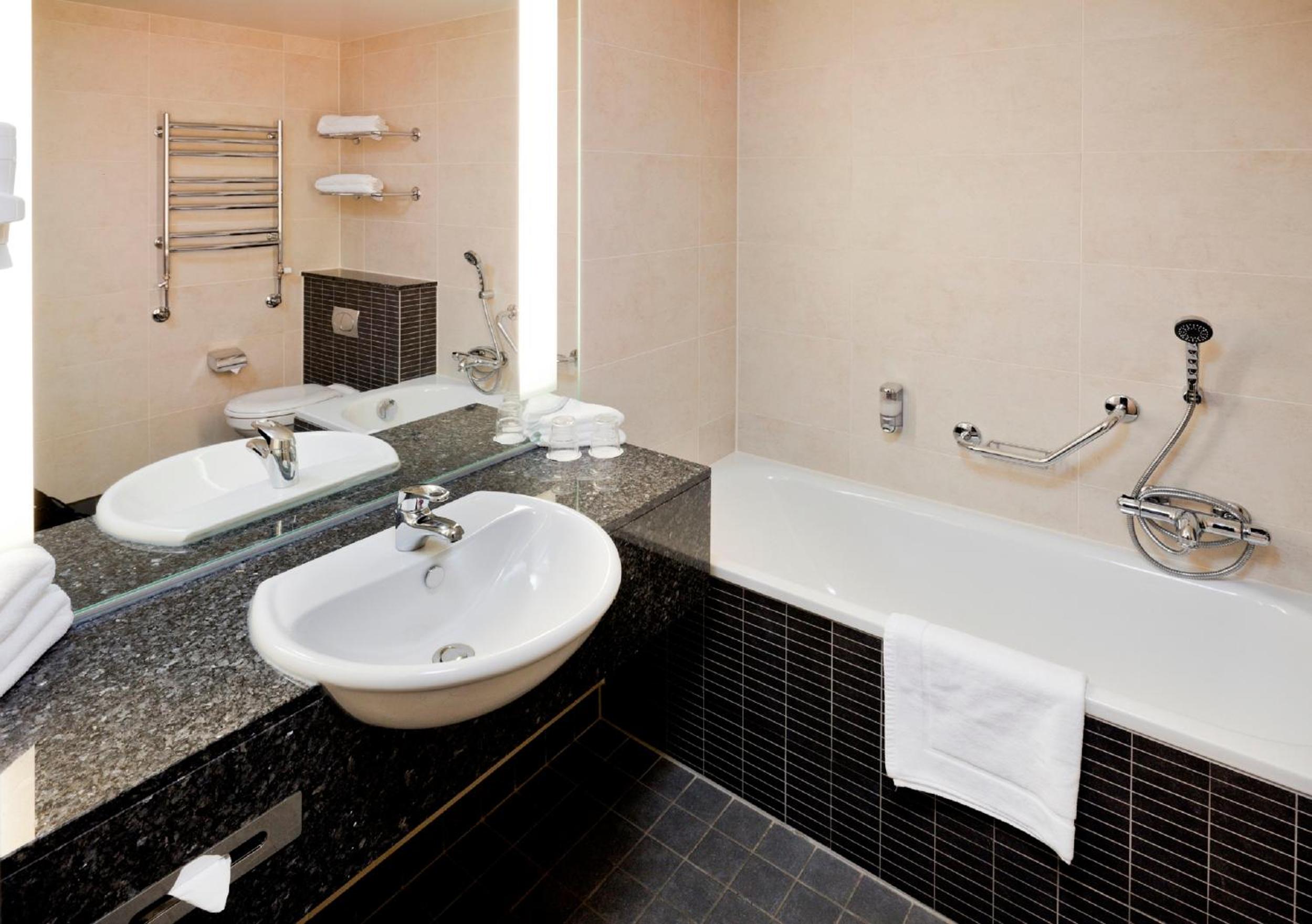 Relax in style with a modern bath experience.