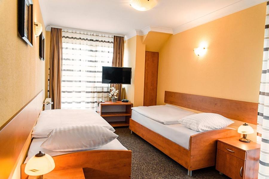 Twin Room - Photo 1