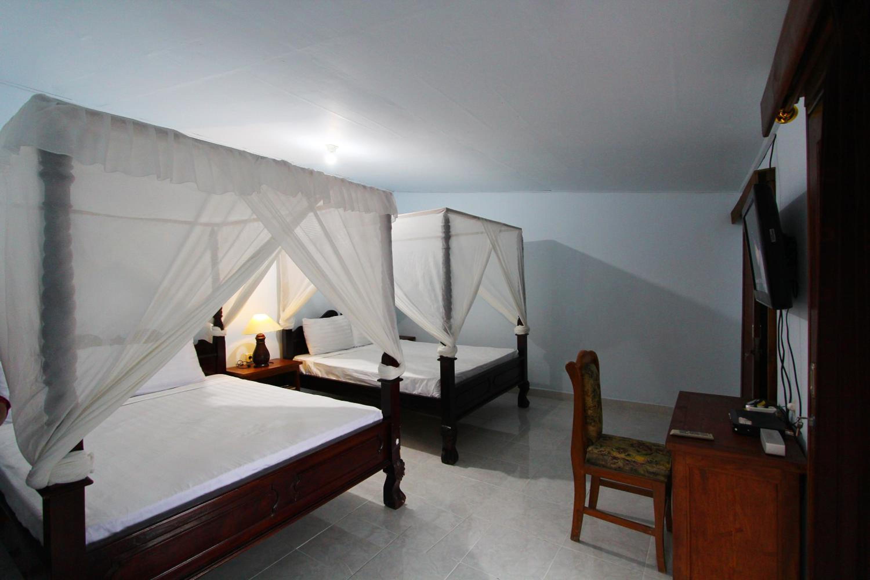 Family Room with Balcony - Photo 1