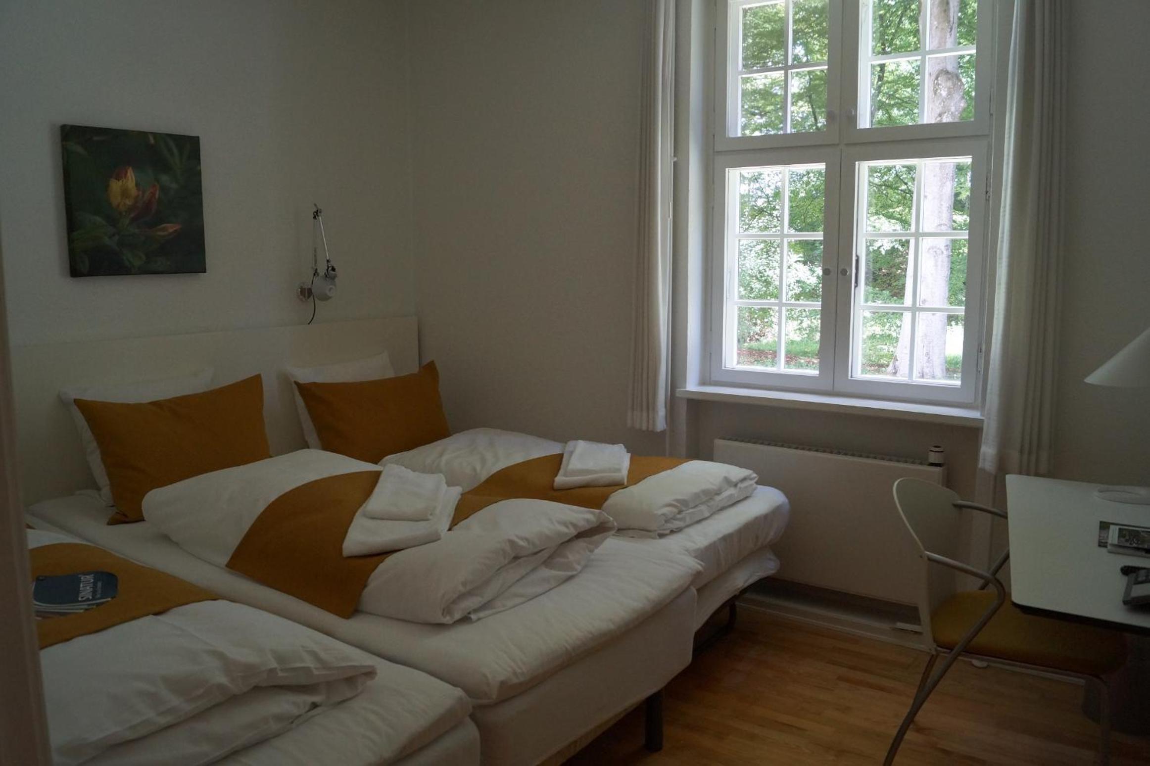 Basic Triple Room (2 Adults + 1 Child)