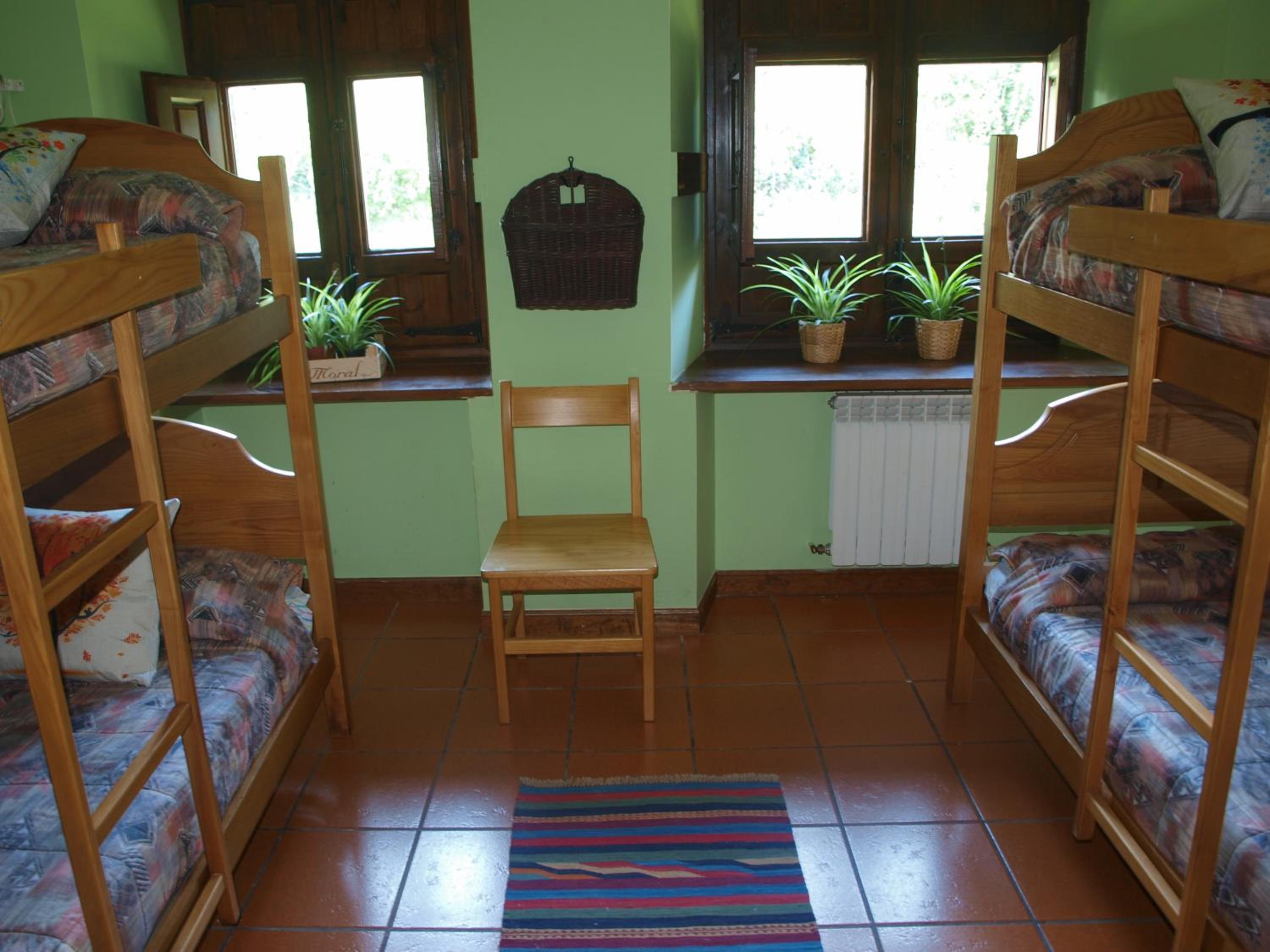 Cama individual en habitación compartida de 4 camas.