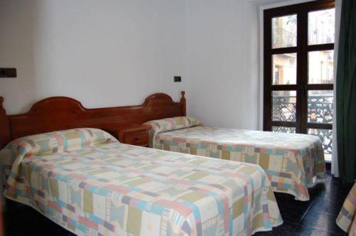 Twin Room - Photo 1