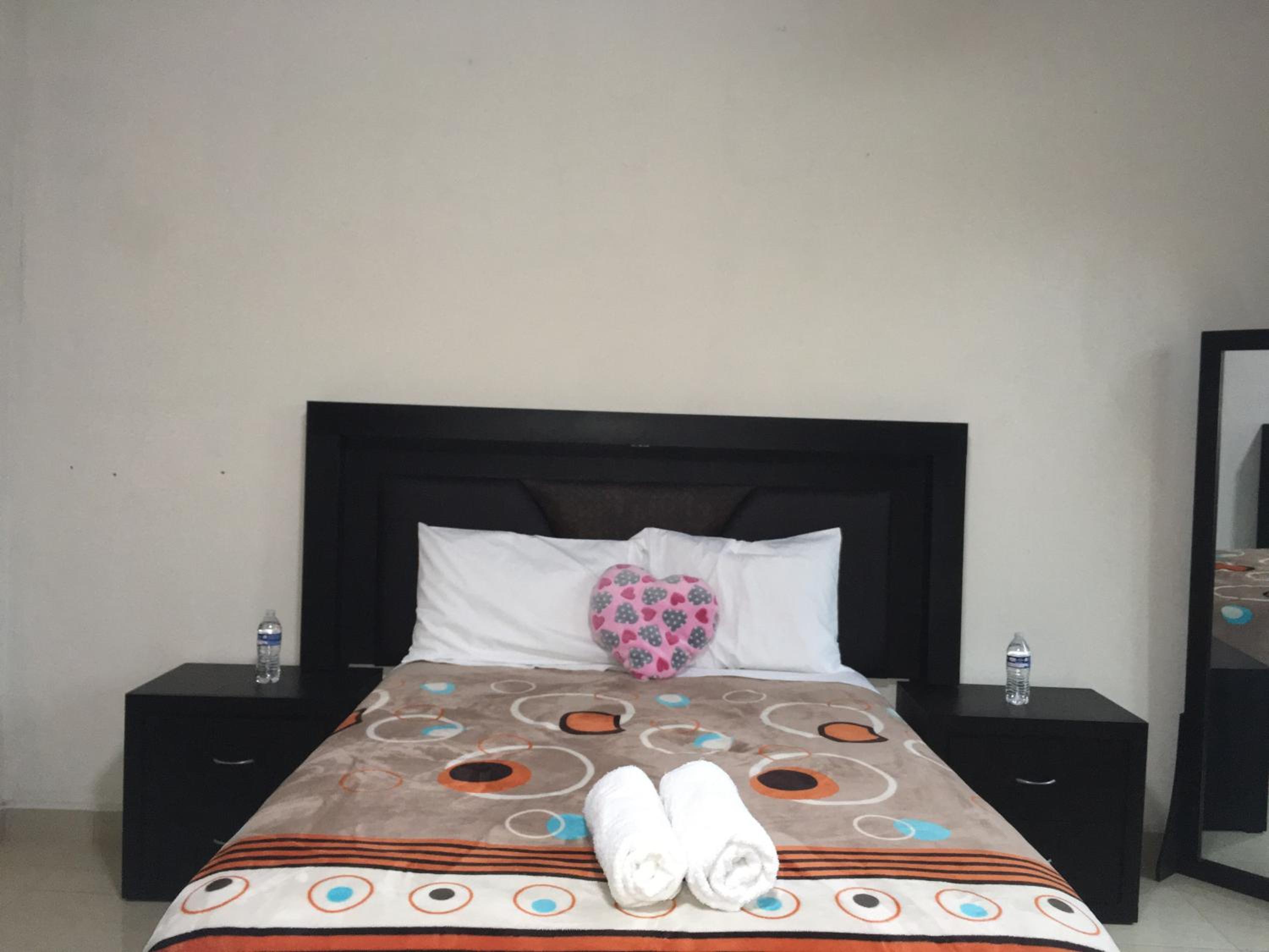 Deluxe Queen Room with Two Queen Beds - Photo 1