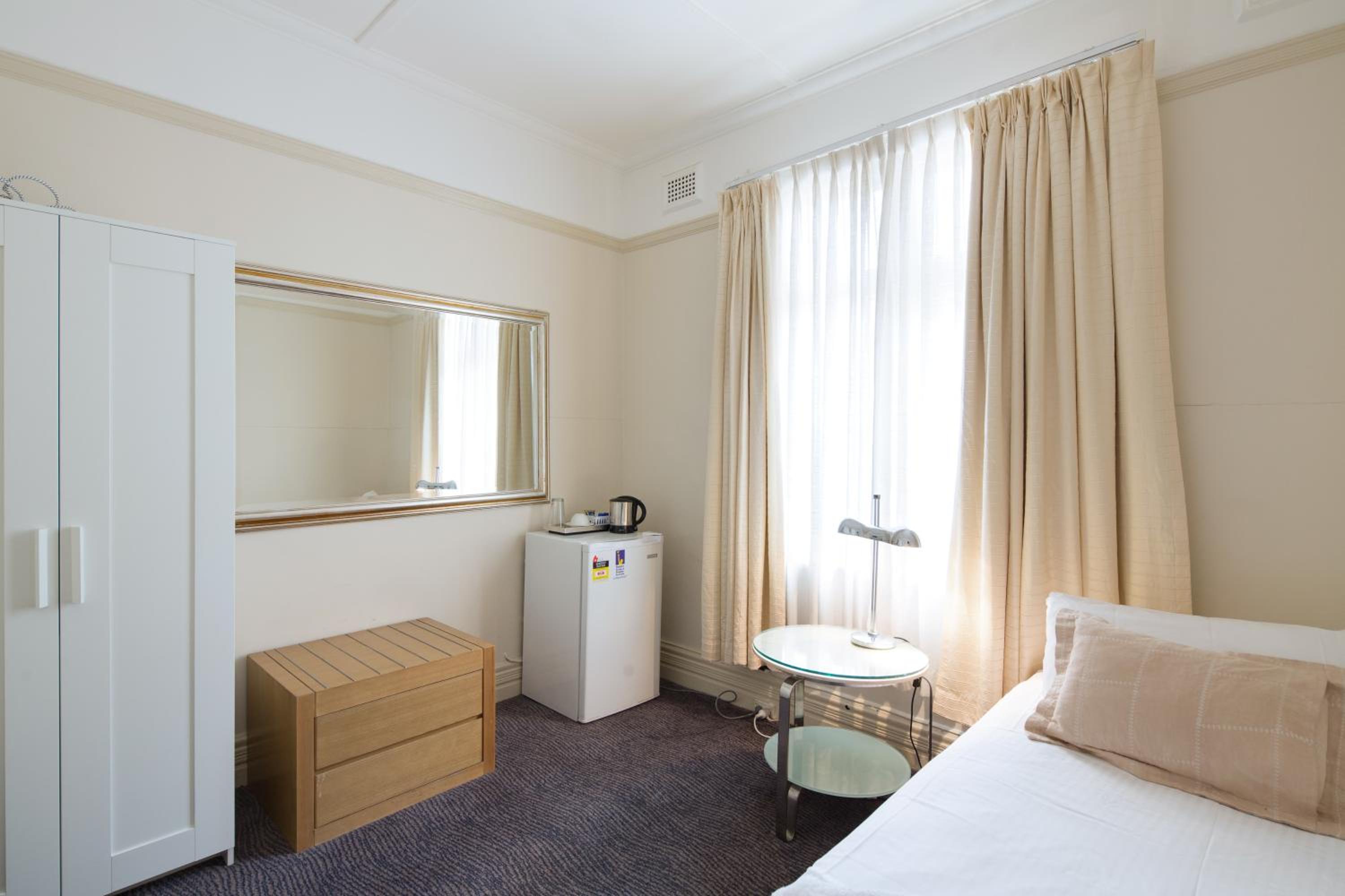 Basic Single Room with Shared Bathroom